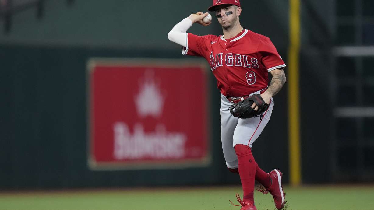 FILE - Los Angeles Angels shortstop Zach Neto throws out Houston Astros' Mauricio Dubón on a ground ball during the eighth inning of a baseball game, Sept. 19, 2024, in Houston.