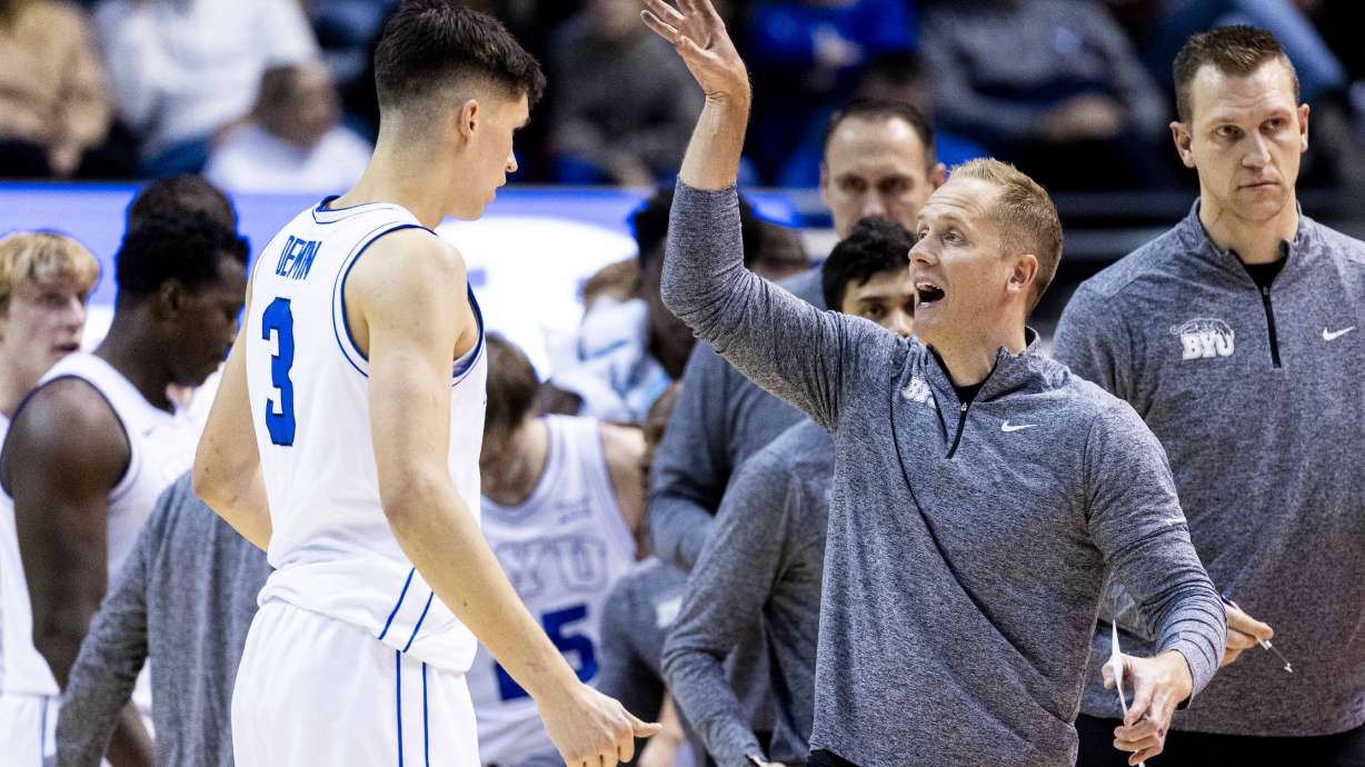 Brigham Young head coach Kevin Young talks with guard Egor Demin (3) during a timeout in an NCAA men’s basketball game against UC Riverside held at the Marriott Center on the campus of BYU in Provo on Friday, Nov. 8, 2024.