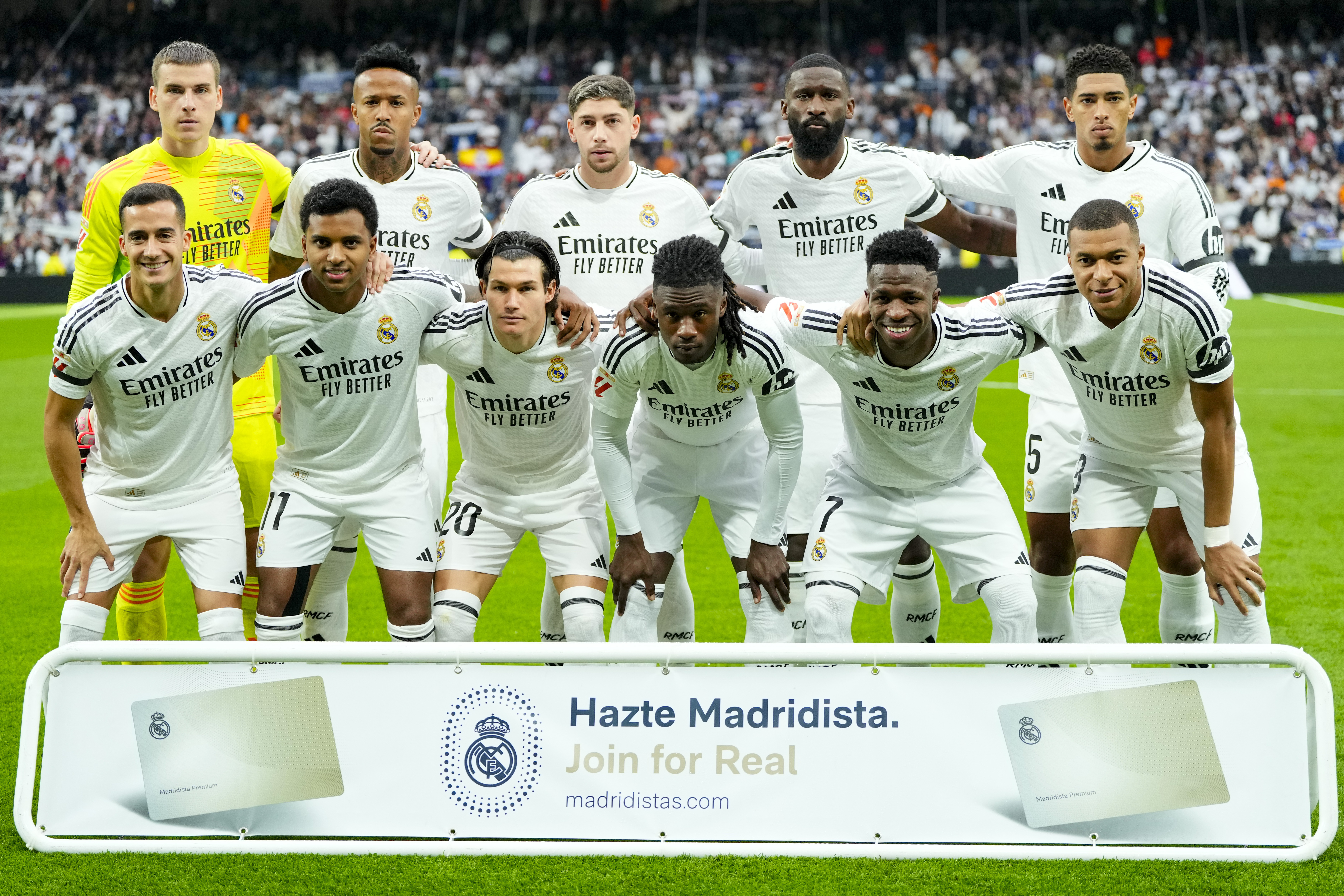 Real Madrid's players pose for the team photograph before the Spanish La Liga soccer match between Real Madrid and Osasuna at the Santiago Bernabeu stadium in Madrid, Spain, Saturday, Nov. 9, 2024.
