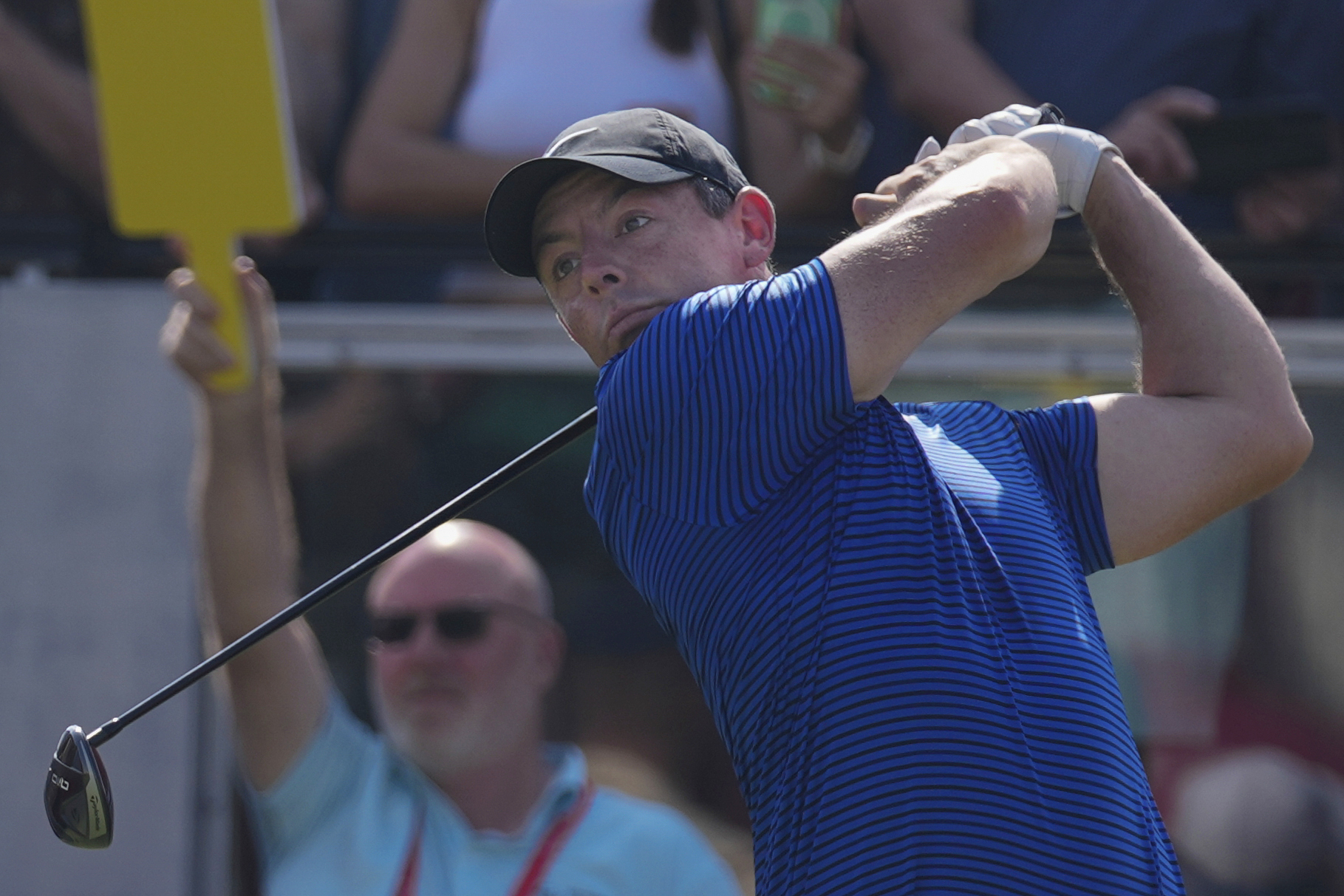 Rory McIlroy of Northern Ireland tees off at the 1st hole during the third round of Abu Dhabi Golf Championship in Abu Dhabi, United Arab Emirates, Saturday, Nov. 9, 2024.