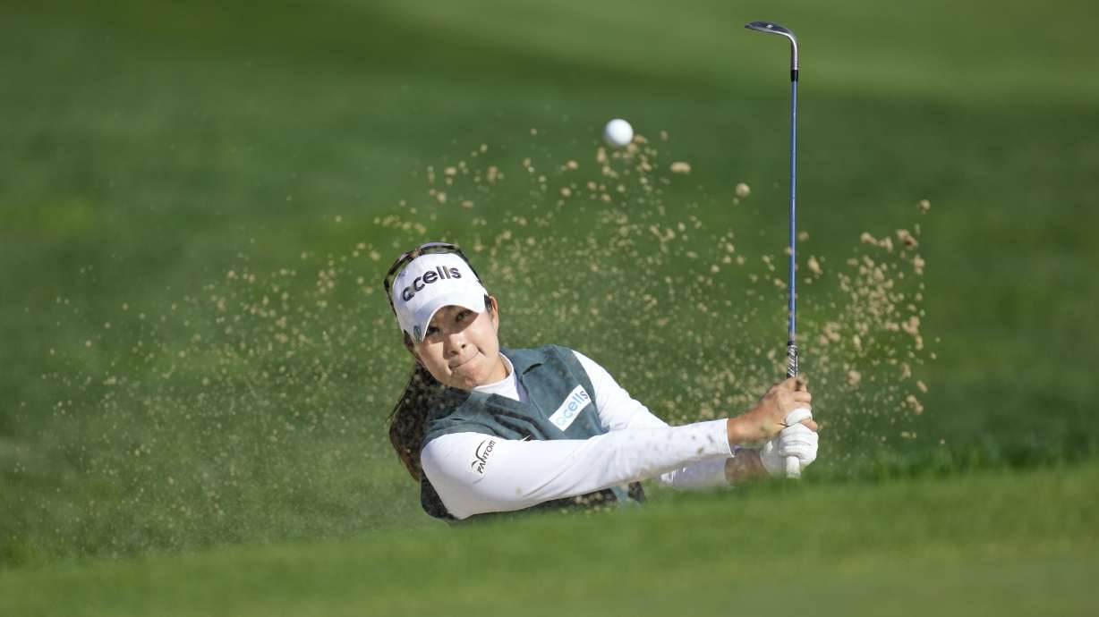 A Lim Kim of South Korea hits out of a bunker on the 3rd hole during the final round of the LPGA Ladies Championship golf tournament at the Seowon Valley Country Club in Paju, South Korea, Sunday, Oct. 20, 2024.