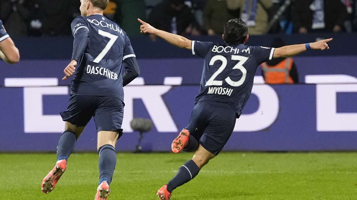 Bochum's Koji Miyoshi celebrates after scoring during the German Bundesliga soccer match between VfL Bochum and Bayer Leverkusen in Bochum, Germany, Saturday, Nov. 9, 2024.