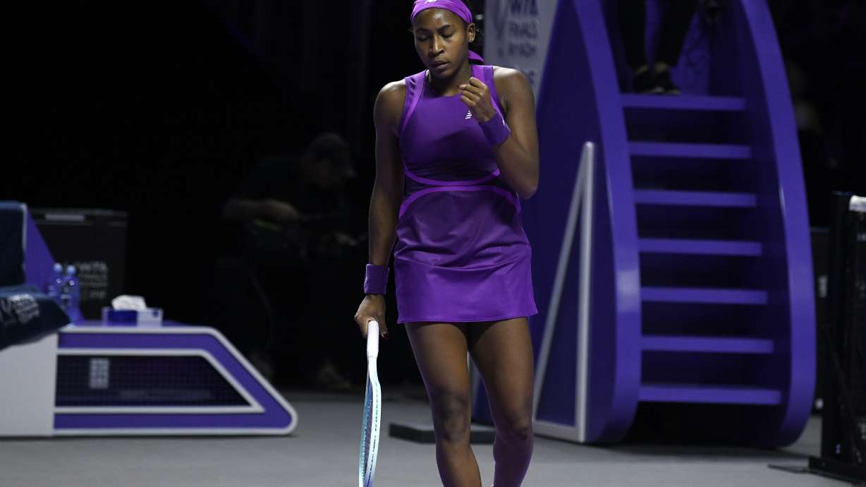 Coco Gauff of the U.S. celebrates a point against China's Qinwen Zheng during their women's singles final match of the WTA finals at the King Saud University Indoor Arena, in Riyadh, Saudi Arabia, Saturday, Nov. 9, 2024.