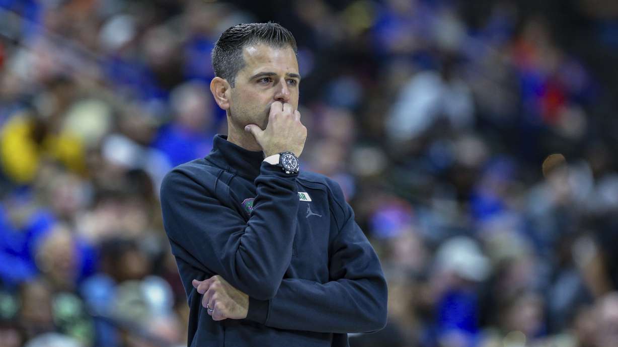 Florida head coach Todd Golden watches play during the second half of an NCAA college basketball game against South Florida, Monday, Nov. 4, 2024, in Jacksonville, Fla. Florida defeated South Florida 98-83.