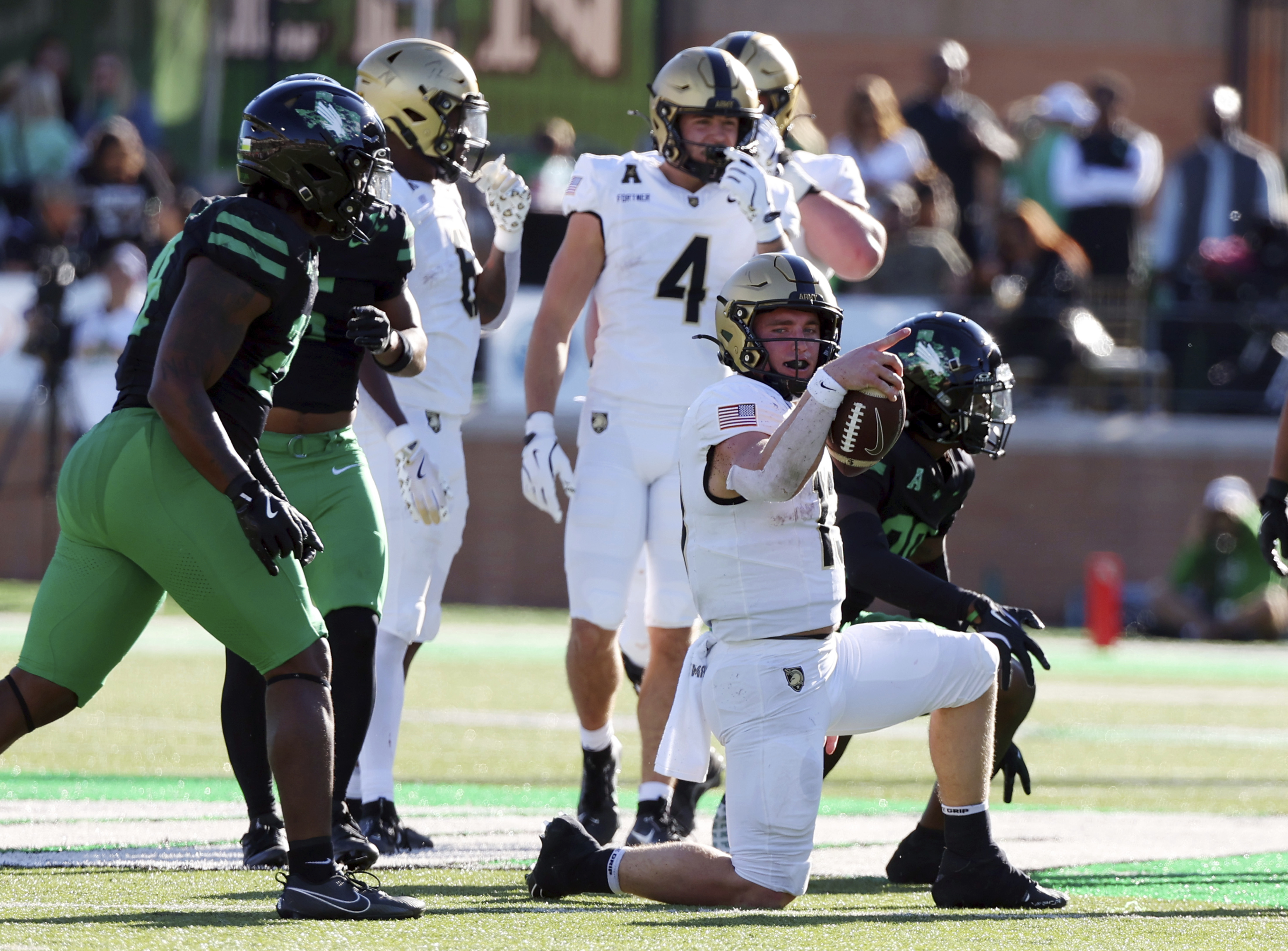 Army quarterback Bryson Daily (13) gestures after a first down against North Texas in the first half of an NCAA football game Saturday, Nov. 9, 2024, in Denton, Texas.