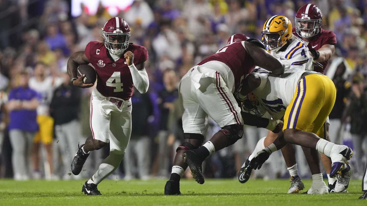 Alabama quarterback Jalen Milroe (4) carries on a long touchdown carry in the first half an NCAA college football game against LSU in Baton Rouge, La., Saturday, Nov. 9, 2024.