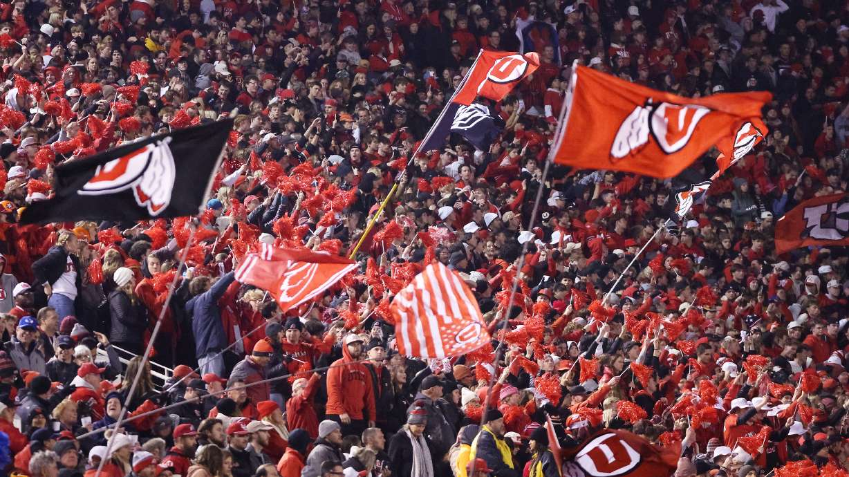 Utah Utes fans cheer at Rice-Eccles Stadium in Salt Lake City on Nov. 9. A North Salt Lake man was charged Thursday with aggravated assault accusing him of throwing a water bottle onto the field after that game and injuring a BYU cheer coach.