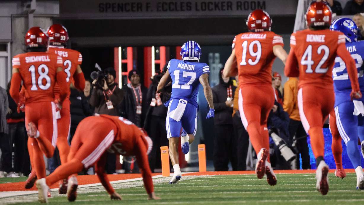 Brigham Young wide receiver Keelan Marion (17) scores on a kickoff return at Rice-Eccles Stadium in Salt Lake City on Saturday, Nov. 9, 2024.
