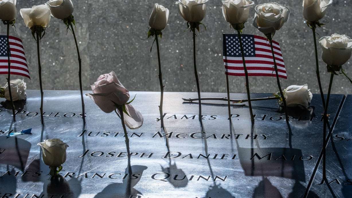Decorations are left behind on the panel of names at the 9/11 memorial site in New York City on Sept. 11. The U.S. government plans to appeal a military judge’s ruling that plea deals with the alleged 9/11 conspirators at Guantanamo Bay.