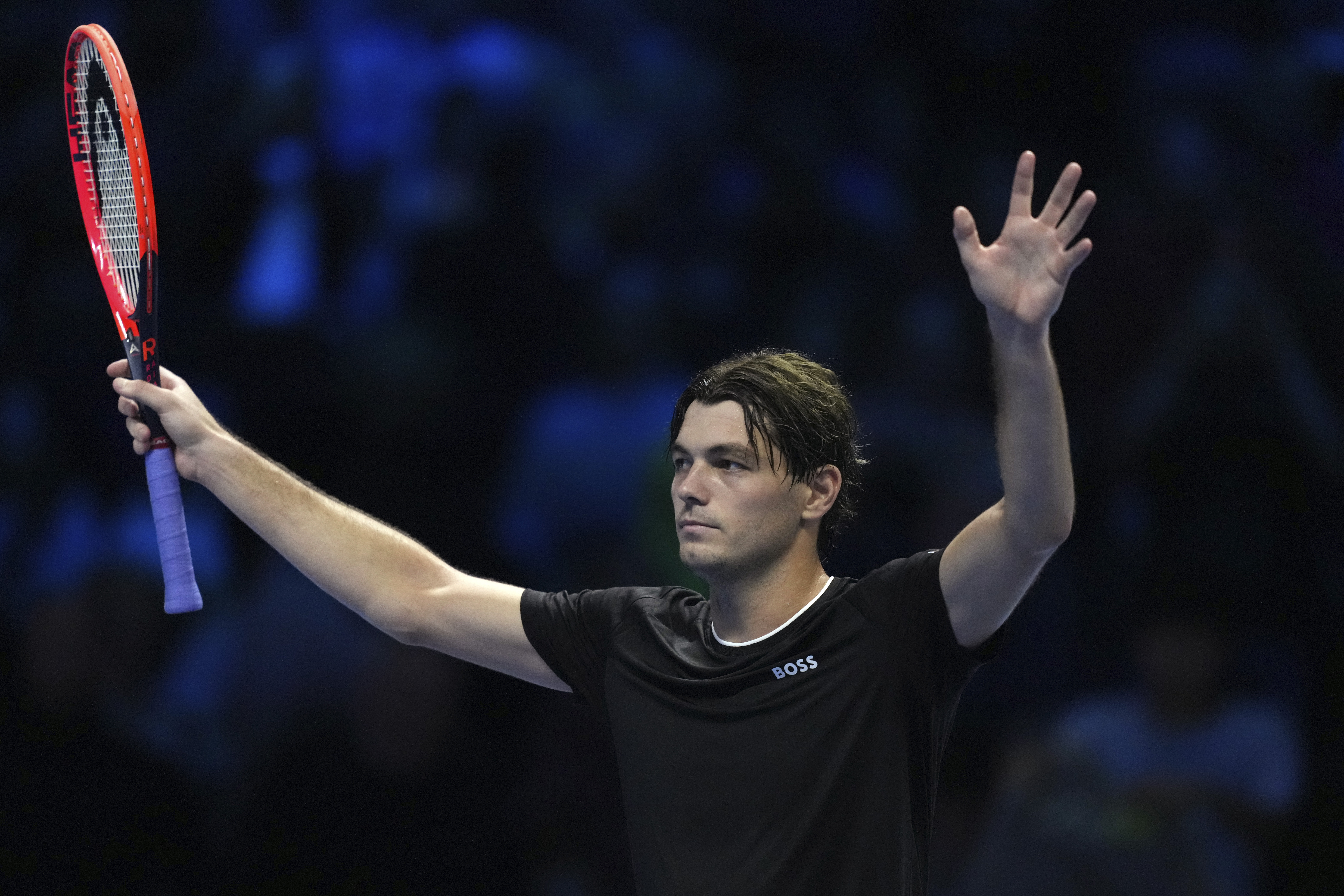 United States' Taylor Fritz celebrates after winning against Russia's Daniil Medvedev the singles tennis match of the ATP World Tour Finals at the Inalpi Arena, in Turin, Italy, Sunday, Nov. 10, 2024.