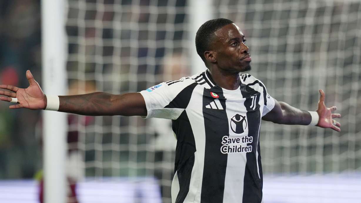 Juventus' Timothy Weah celebrates after scoring their side's first goal of the game during the Serie A soccer match between Juventus and Torino at Allianz Stadium in Turin, Italy, Saturday, Nov. 9 , 2024.