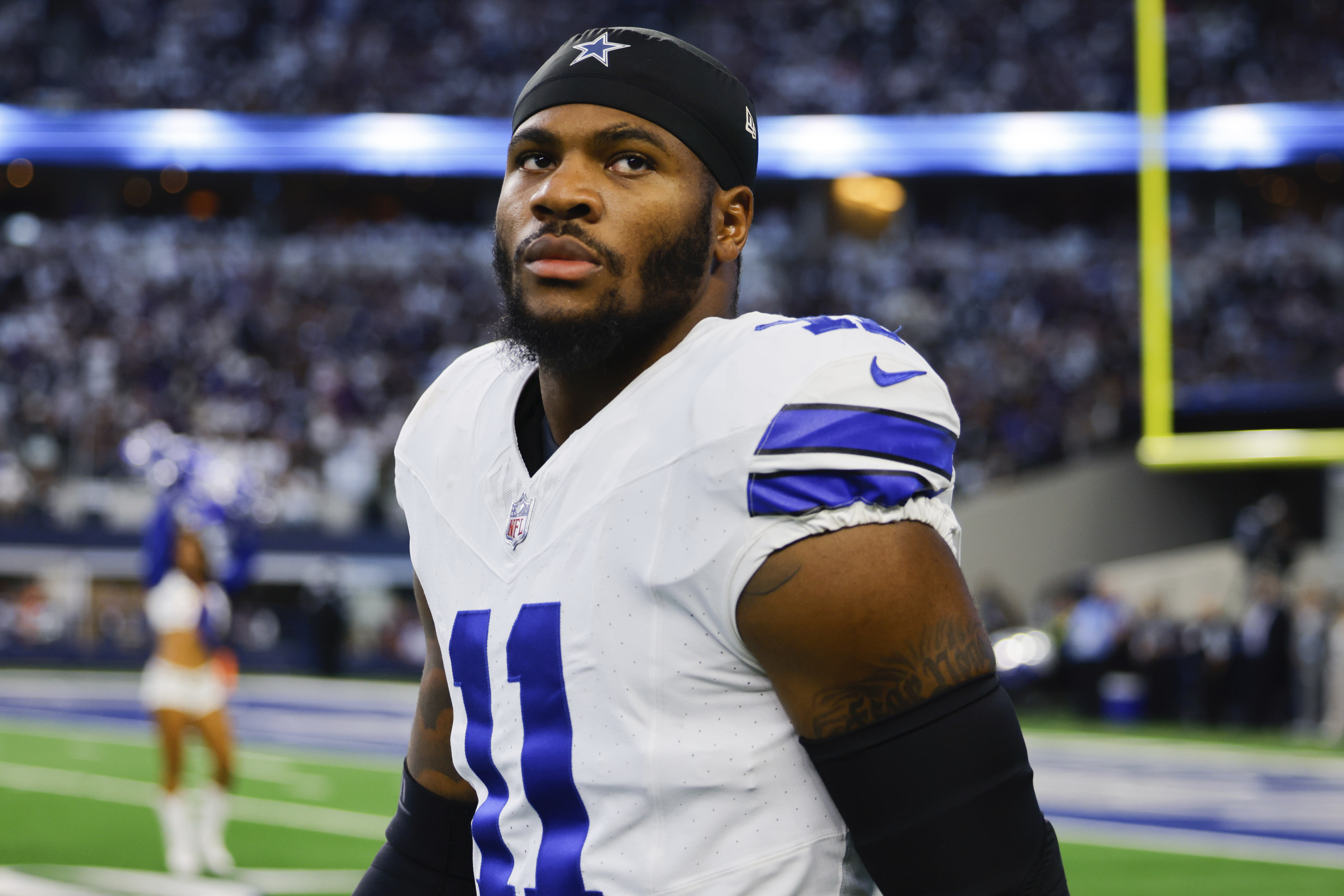 FILE - Dallas Cowboys linebacker Micah Parsons looks into the stands before an NFL football game against the Baltimore Ravens, Sept. 22, 2024 in Arlington, Texas.