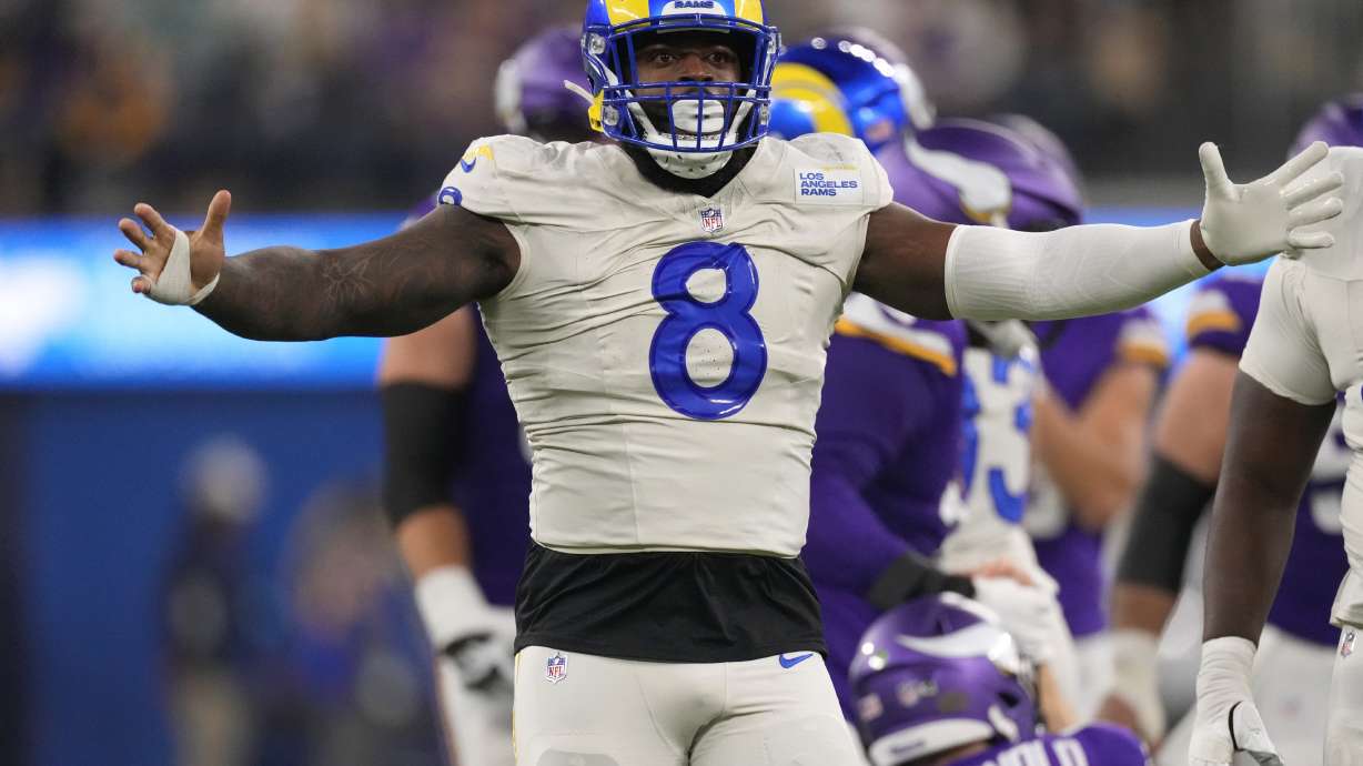 Los Angeles Rams linebacker Jared Verse (8) celebrates after sacking Minnesota Vikings quarterback Sam Darnold (14) during the first half of an NFL football game, Thursday, Oct. 24, 2024, in Inglewood, Calif.