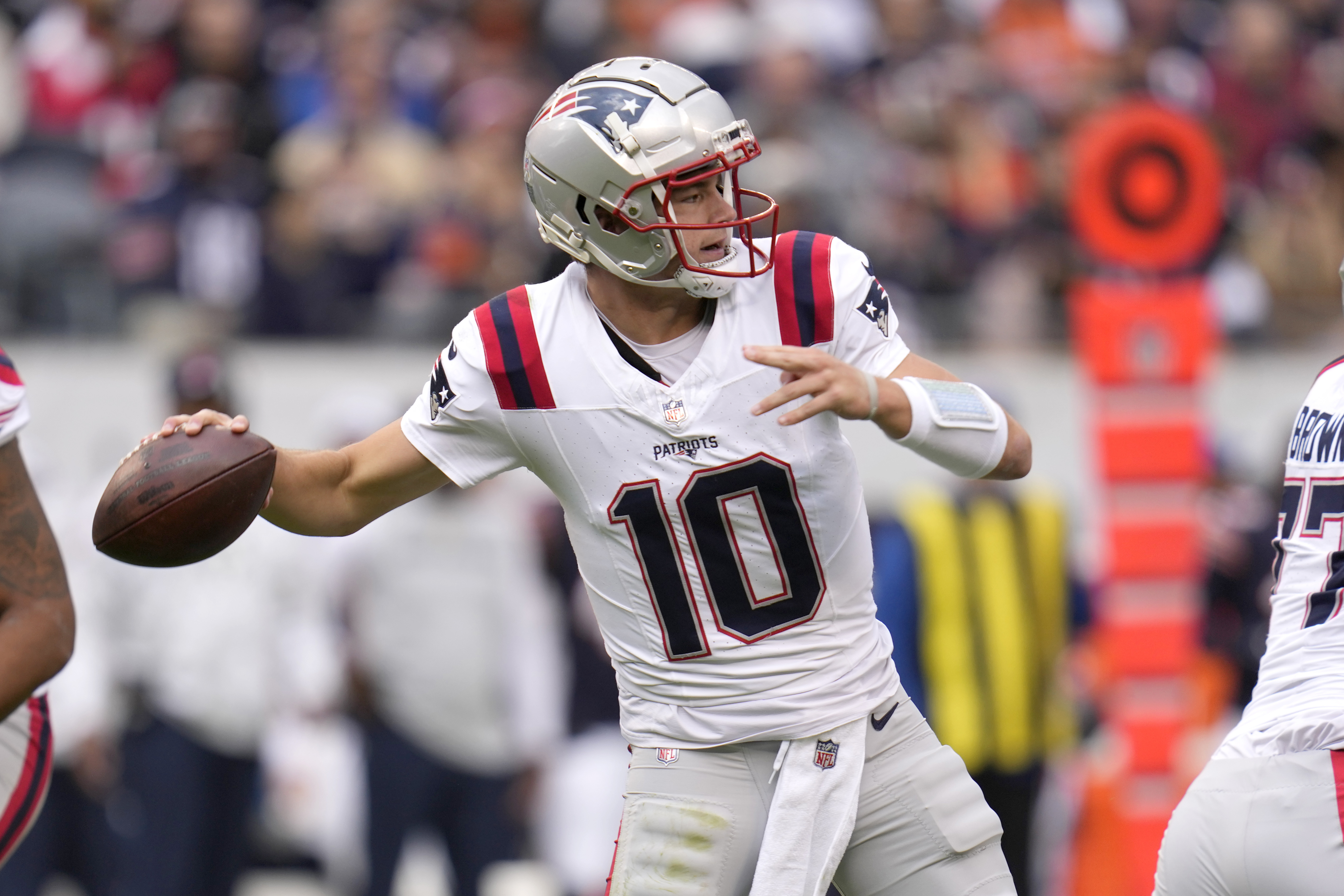 New England Patriots quarterback Drake Maye passes during the first half of an NFL football game against the Chicago Bears on Sunday, Nov. 10, 2024, in Chicago.