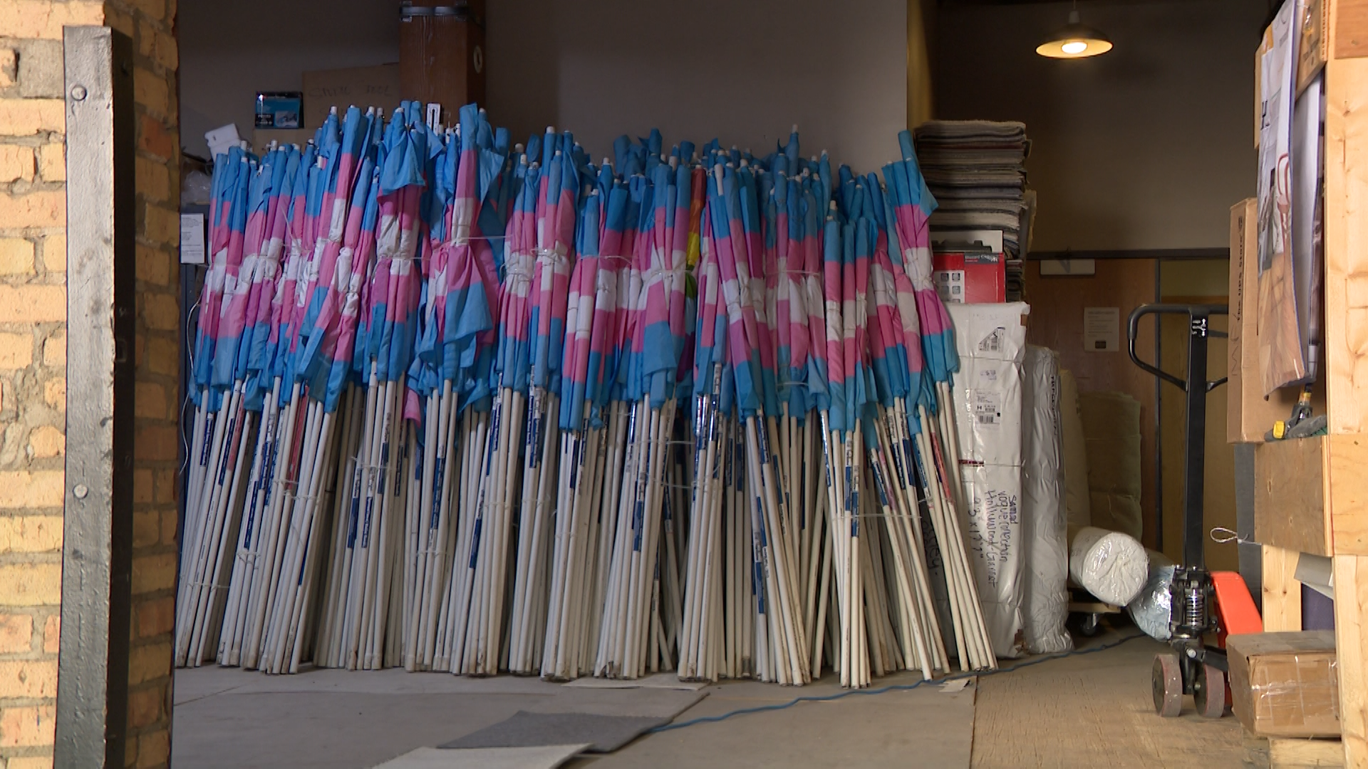 Nonprofit distributes pride flags ahead of Transgender Awareness Week