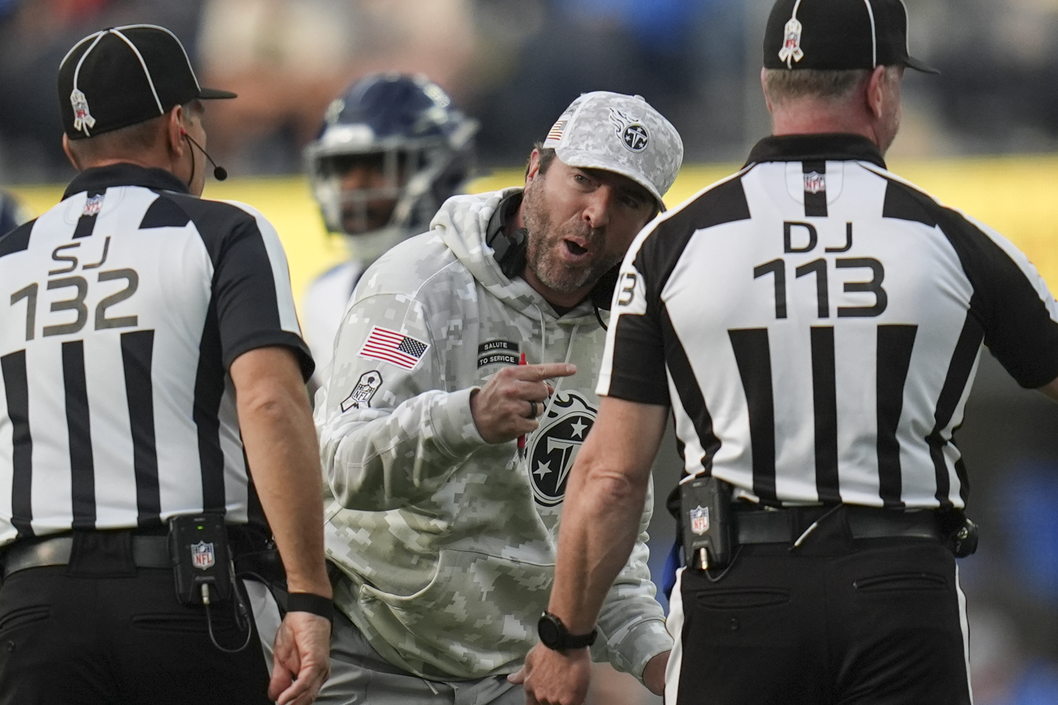 Tennessee Titans head coach Brian Callahan yells at officials during the first half of an NFL football game against the Los Angeles Chargers, Sunday, Nov. 10, 2024, in Inglewood, Calif.