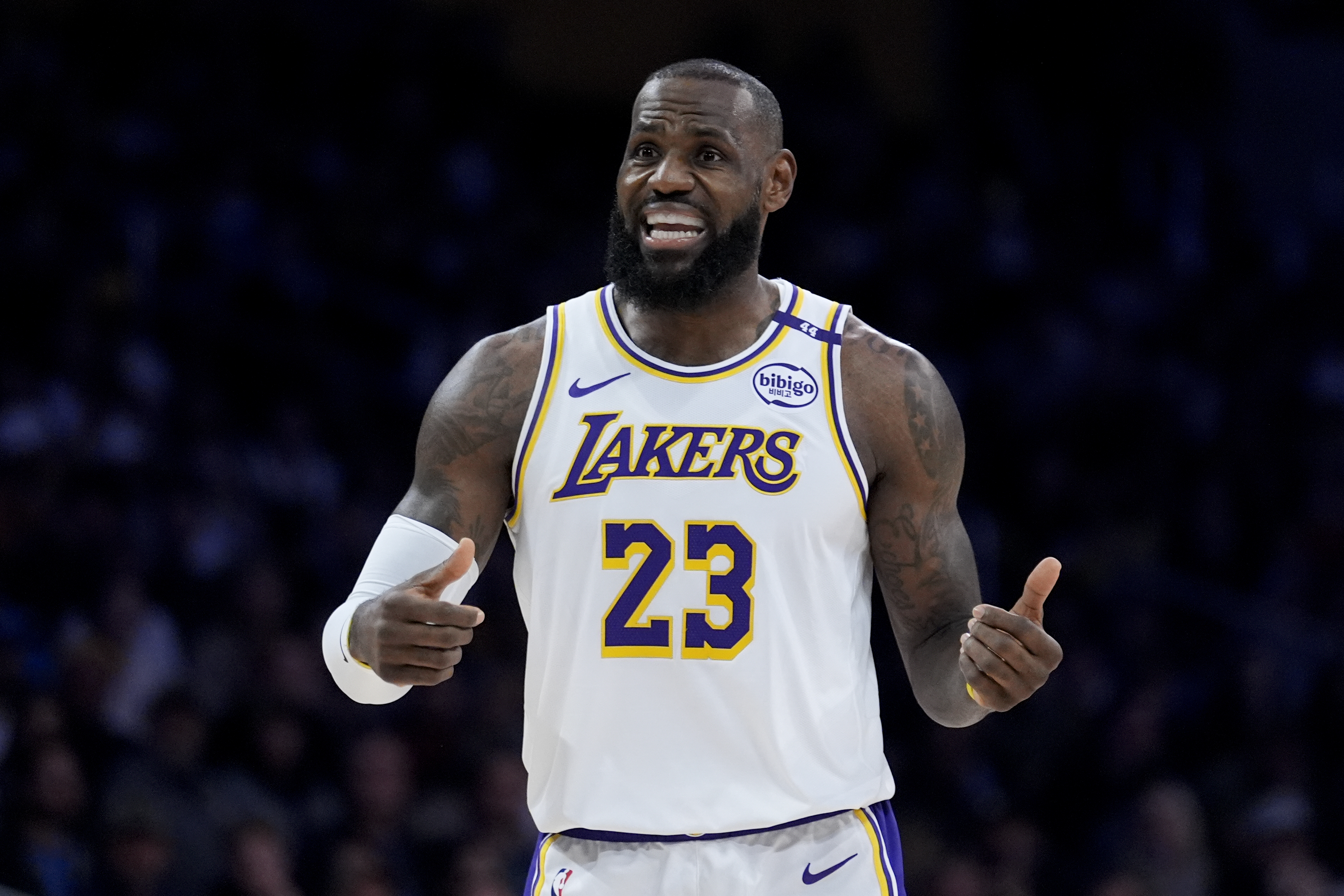 Los Angeles Lakers forward LeBron James (23) directs his teammates during the first half of an NBA basketball game against the Toronto Raptors, Sunday, Nov. 10, 2024, in Los Angeles.