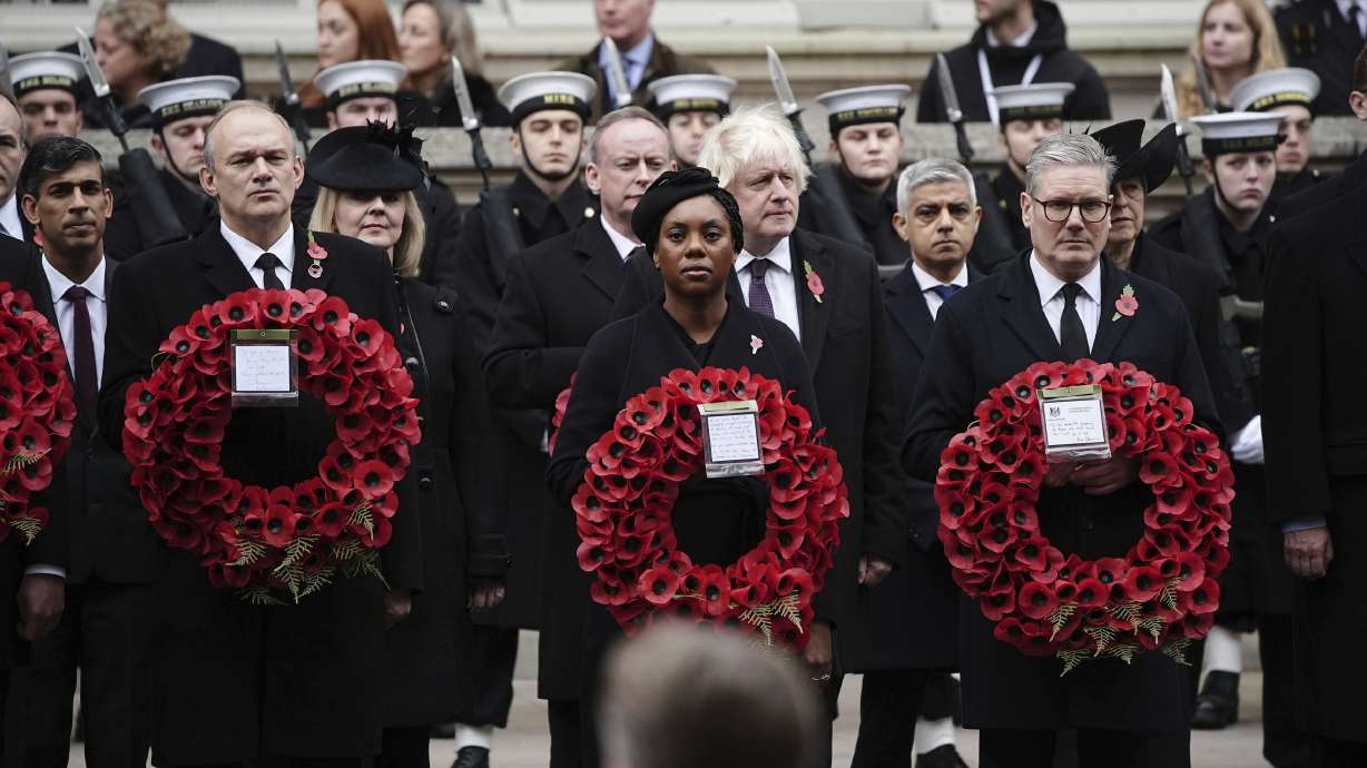 Britain's former Prime Minister Rishi Sunak, Liberal Democrat leader Sir Ed Davey, former Prime Minister Liz Truss, leader of the opposition Kemi Badenoch, former Prime Minister Boris Johnson, Mayor of London Sadiq Khan and Prime Minister Sir Keir Starmer attend the National Service of Remembrance at The Cenotaph in London, England, Sunday.