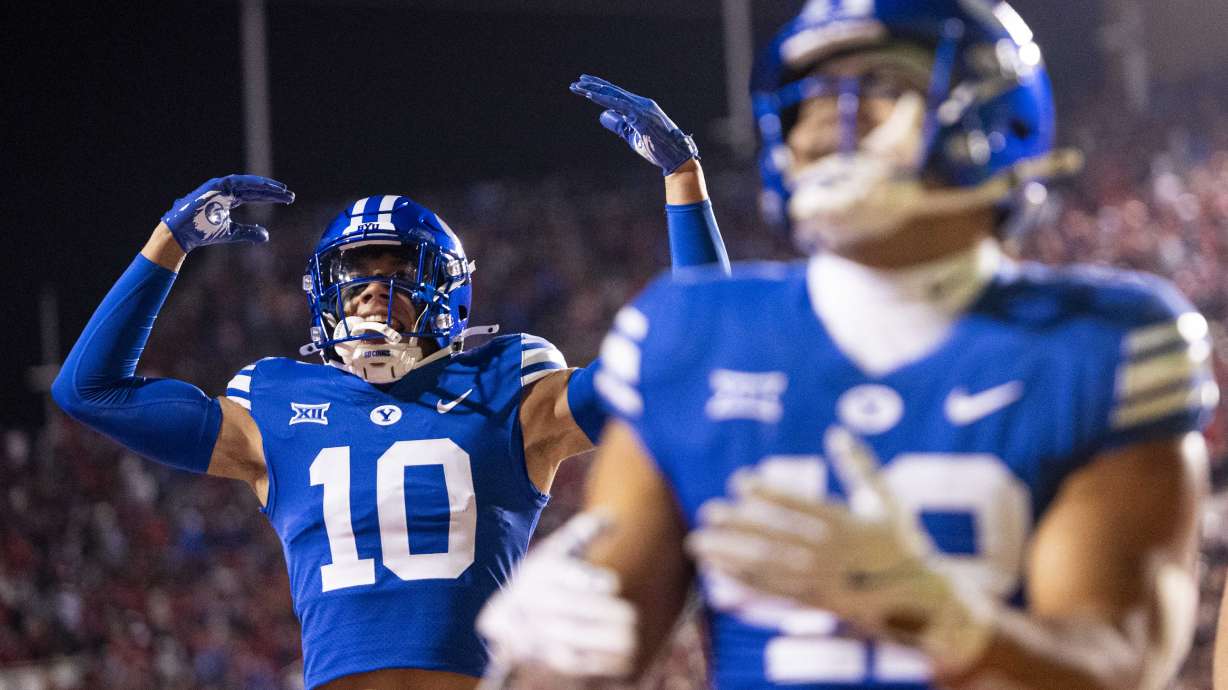 BYU safety Faletau Satuala (10) gestures to the crowd during a game between the University of Utah Utes and the Brigham Young University Cougars held at Rice-Eccles Stadium in Salt Lake City on Saturday, Nov. 9, 2024.