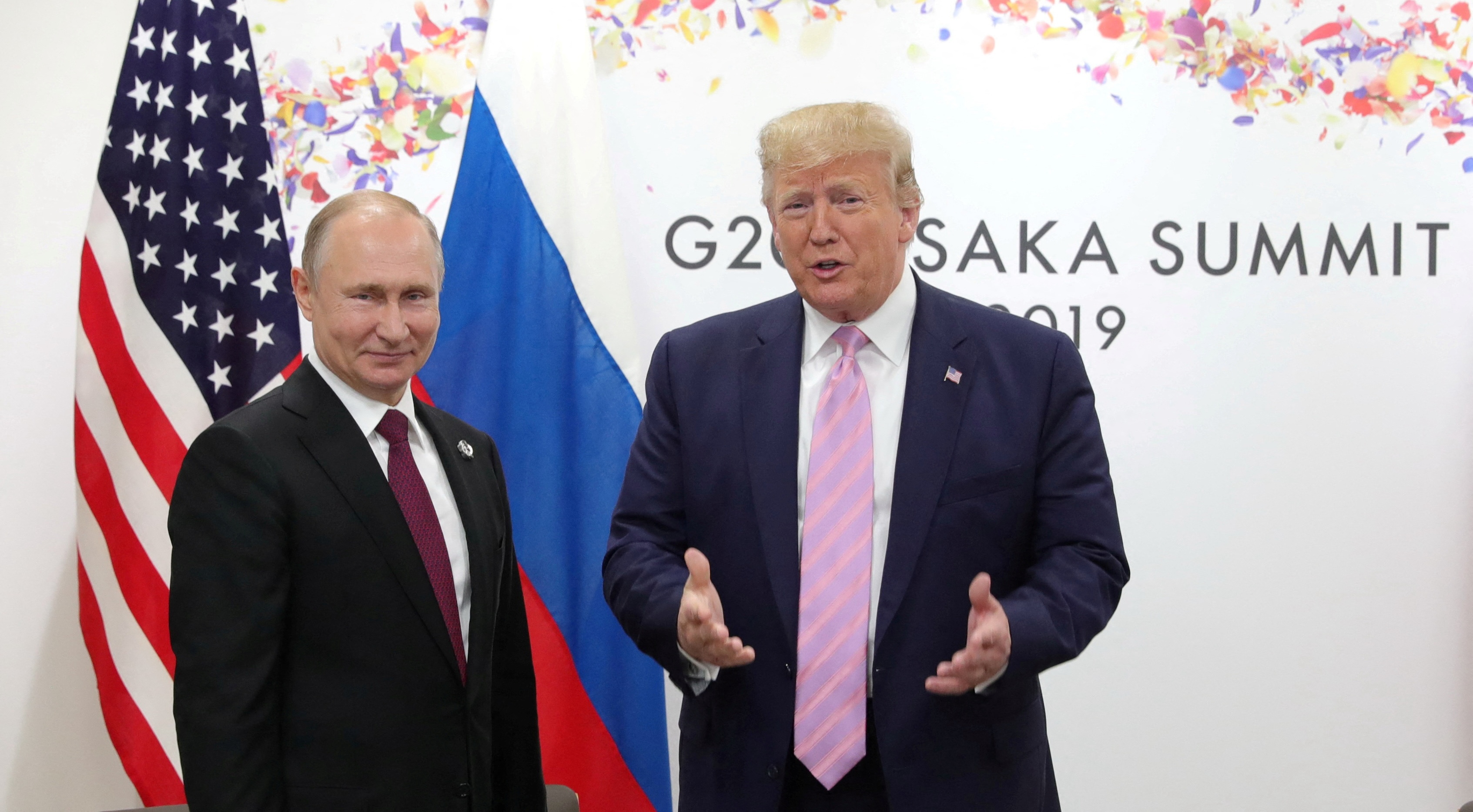 Russian President Vladimir Putin and U.S. President Donald Trump attend a summit in Osaka, Japan, June 28, 2019. The Kremlin denies the two spoke following the Nov. 5 election.