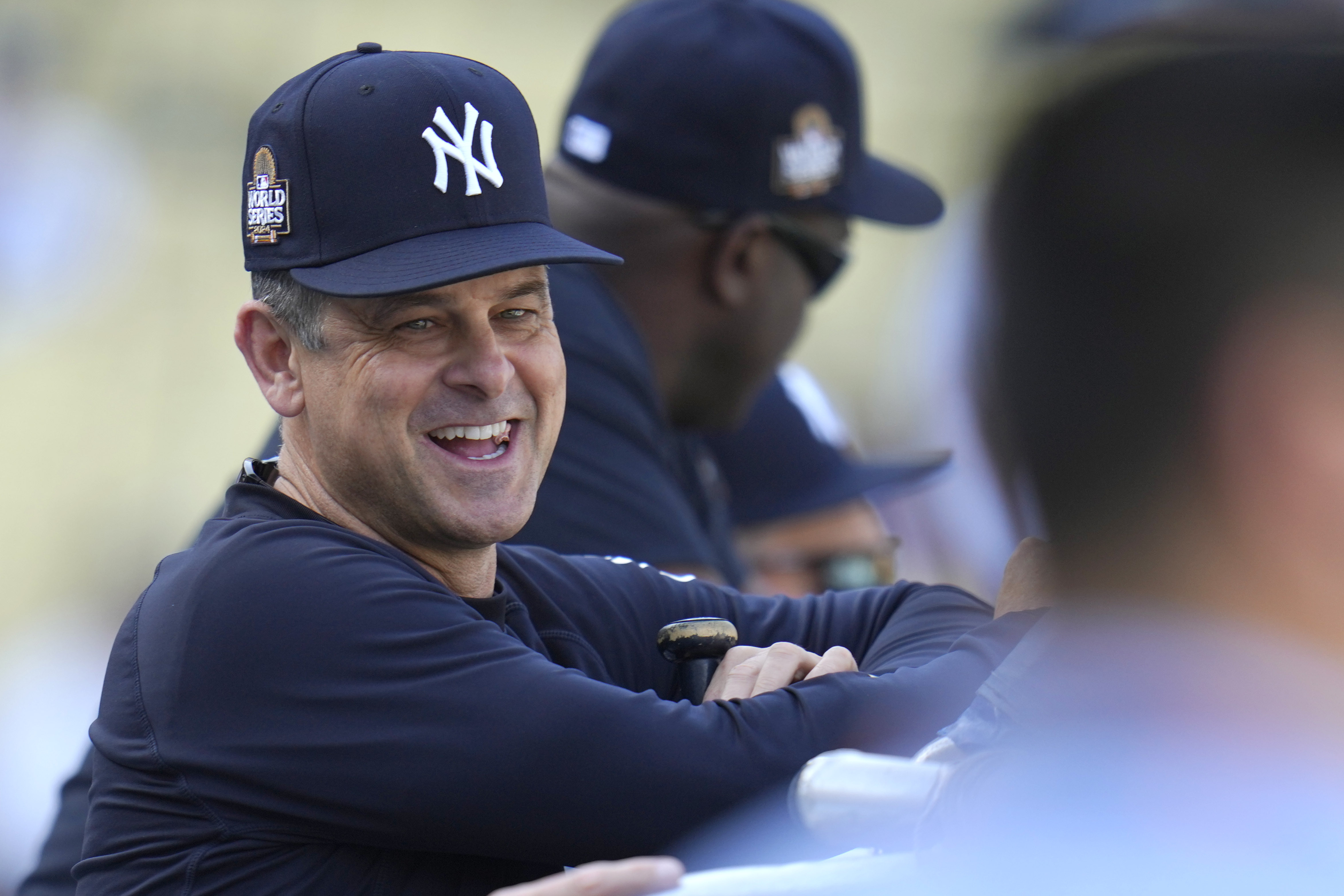 New York Yankees manager Aaron Boone watches batting practice before Game 1 of the baseball World Series, Friday, Oct. 25, 2024, in Los Angeles.