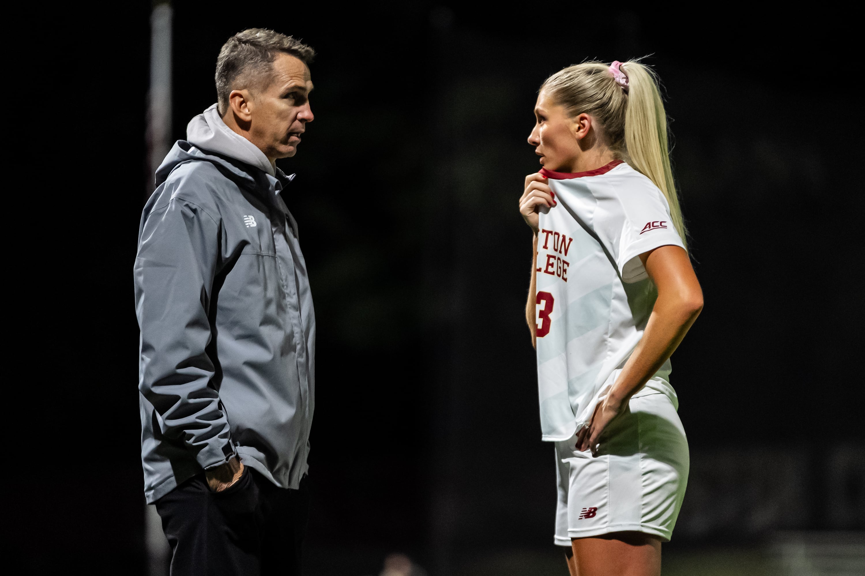 Boston College defender Grace Courter confers with the first-year coach Chris Watkins during the 2024 soccer season.