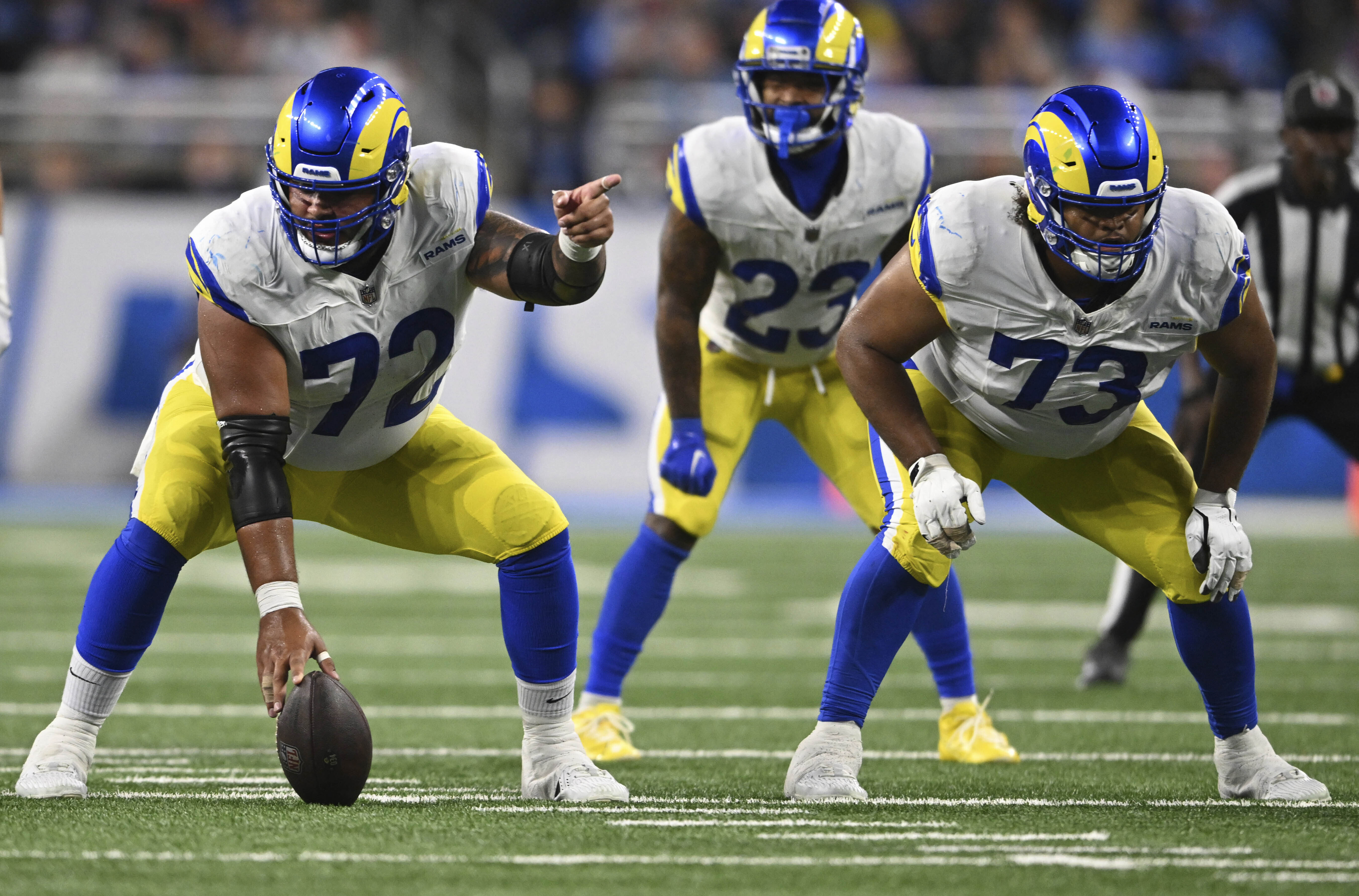 FILE - Los Angeles Rams center Jonah Jackson (72) and guard Steve Avila (73) wait for the snap of the ball during the first half of an NFL football game against the Detroit Lions, Sept. 8, 2024, in Detroit. 