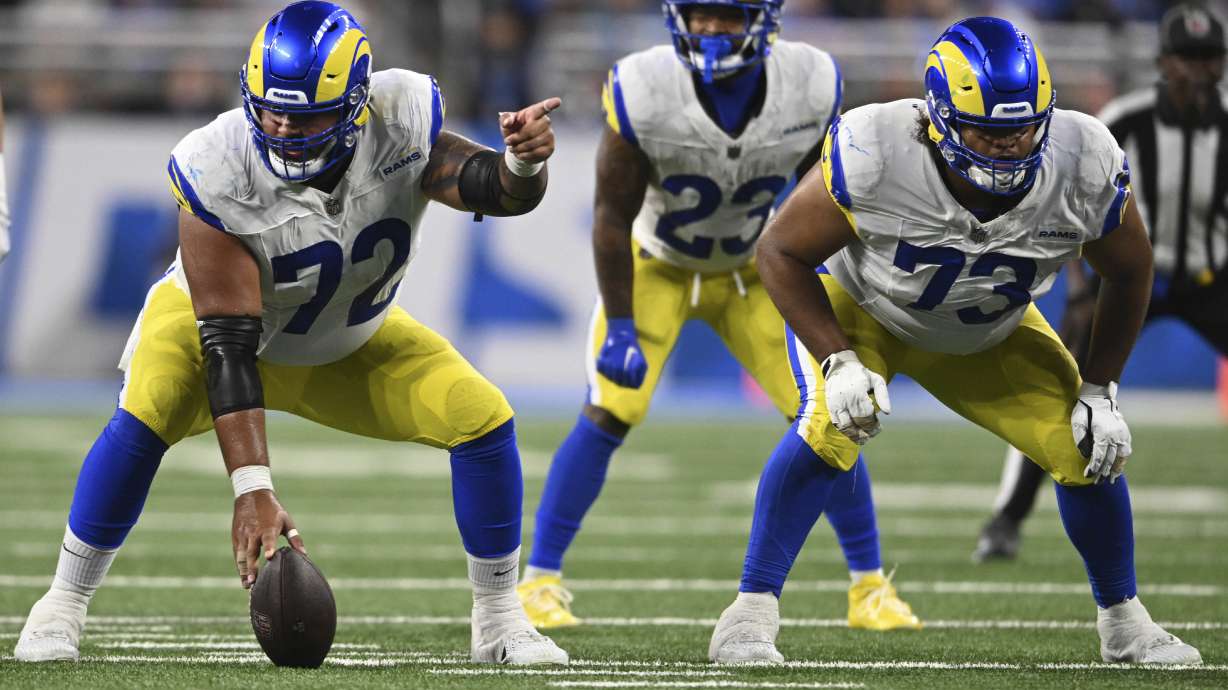 FILE - Los Angeles Rams center Jonah Jackson (72) and guard Steve Avila (73) wait for the snap of the ball during the first half of an NFL football game against the Detroit Lions, Sept. 8, 2024, in Detroit.