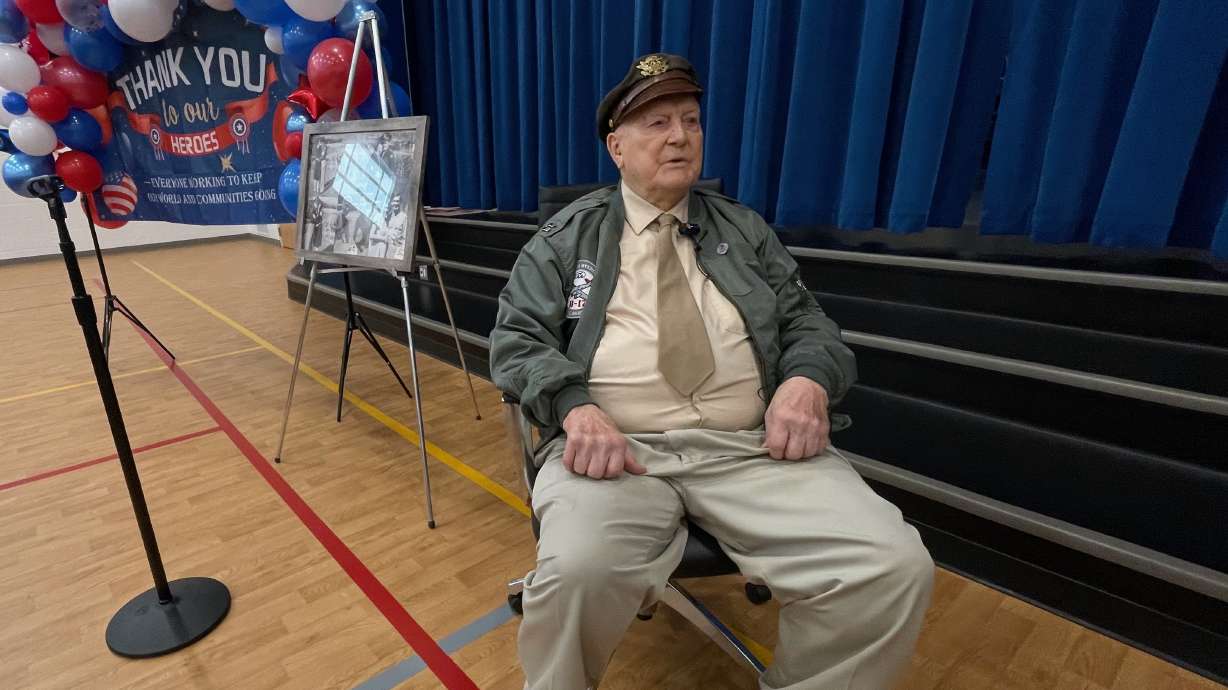 Ray Hobbs, a 100-year-old World War II veteran, spoke to students at East Ridge Elementary in Ogden on Monday, Veterans Day.