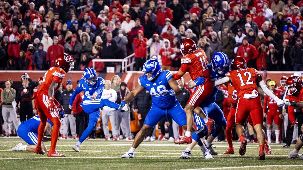 BYU place kicker Will Ferrin (44) kicks and makes a field goal to put the Cougars ahead 22-21 with seconds left on the clock during a game between the University of Utah Utes and the Brigham Young University Cougars held at Rice-Eccles Stadium in Salt Lake City early on Sunday, Nov. 10, 2024.