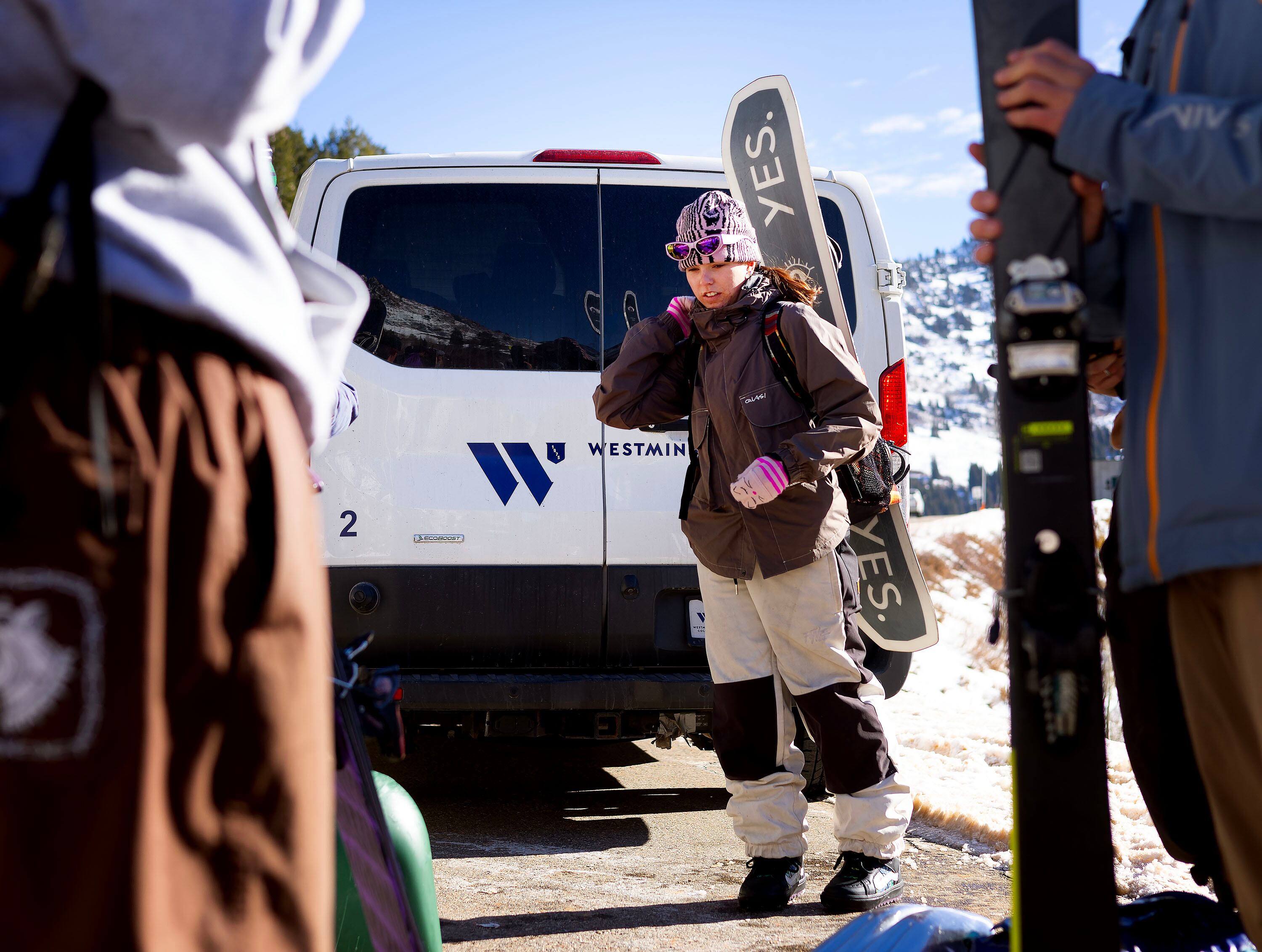 Lorena Kelley, a sophomore and member of Westminster University’s freeski team, gets out of the van for practice in Little Cottonwood Canyon in Salt Lake City on Friday.