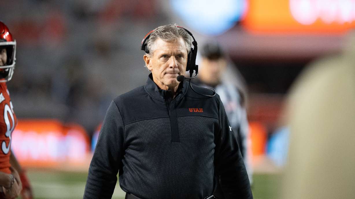 Utah head coach Kyle Whittingham walks the sidelines of the field during a game against rival BYU at Rice-Eccles Stadium on Nov. 9, 2024.