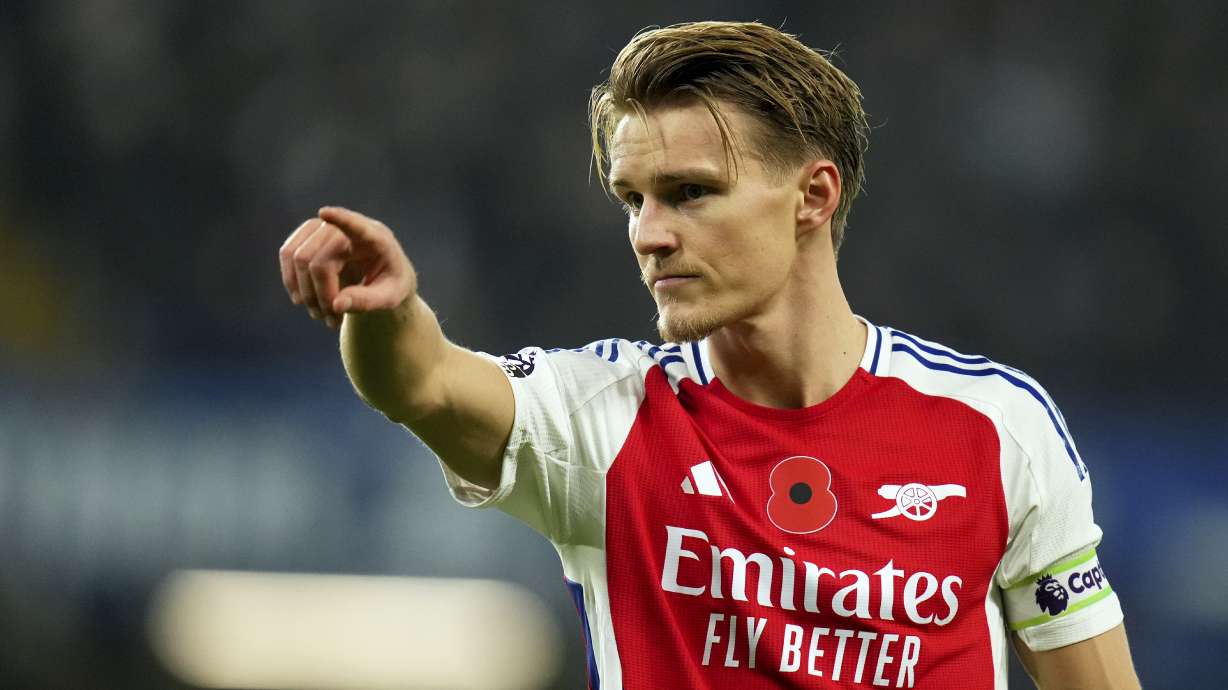 Arsenal's Martin Odegaard gestures during the English Premier League soccer match between Chelsea and Arsenal at Stamford Bridge stadium in London, Sunday, Nov. 10, 2021.