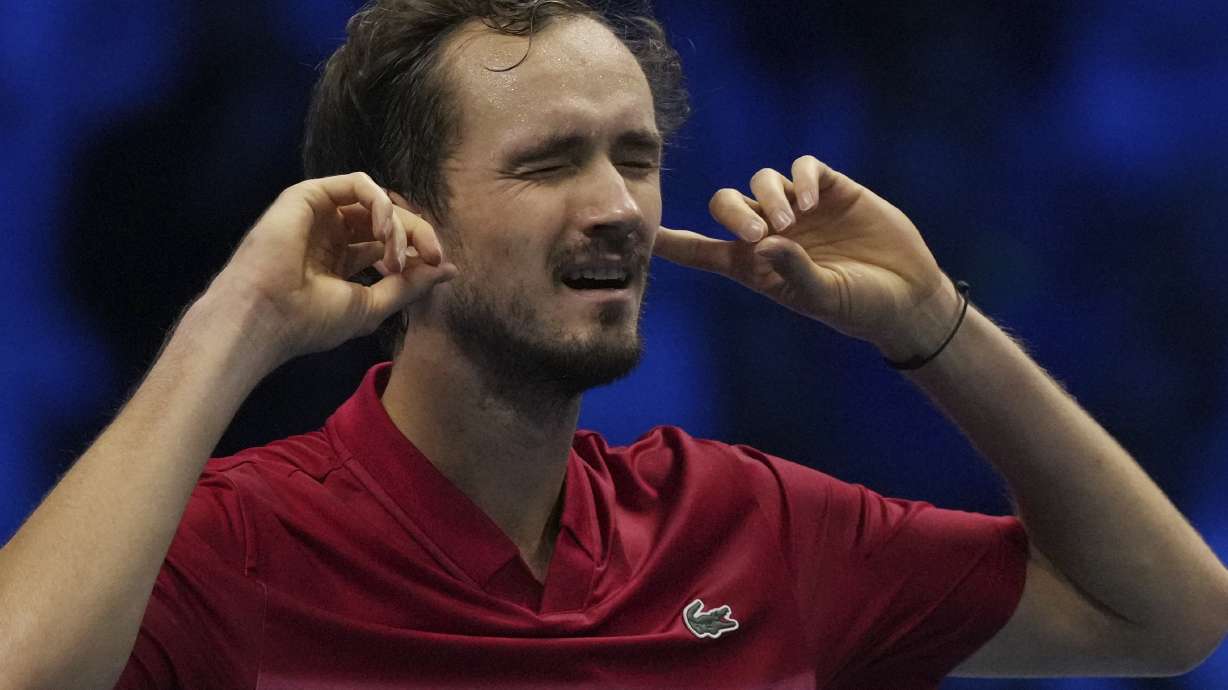 Russia's Daniil Medvedev Australia's Alex de Minaur returns the ball to Russia's Daniil Medvedev Australia's Alex de Minaur during their singles tennis match of the ATP World Tour Finals at the Inalpi Arena, in Turin, Italy, Tuesday, Nov. 12, 2024.