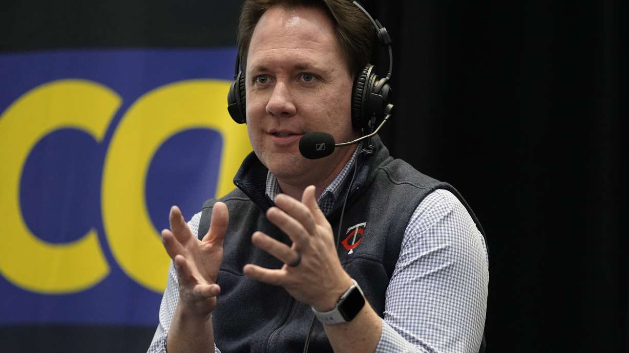 FILE - Minnesota Twins president of baseball operations Derek Falvey speaks to fans and media during the baseball team's annual fan fest at Target Field, Jan. 28, 2023, in Minneapolis.
