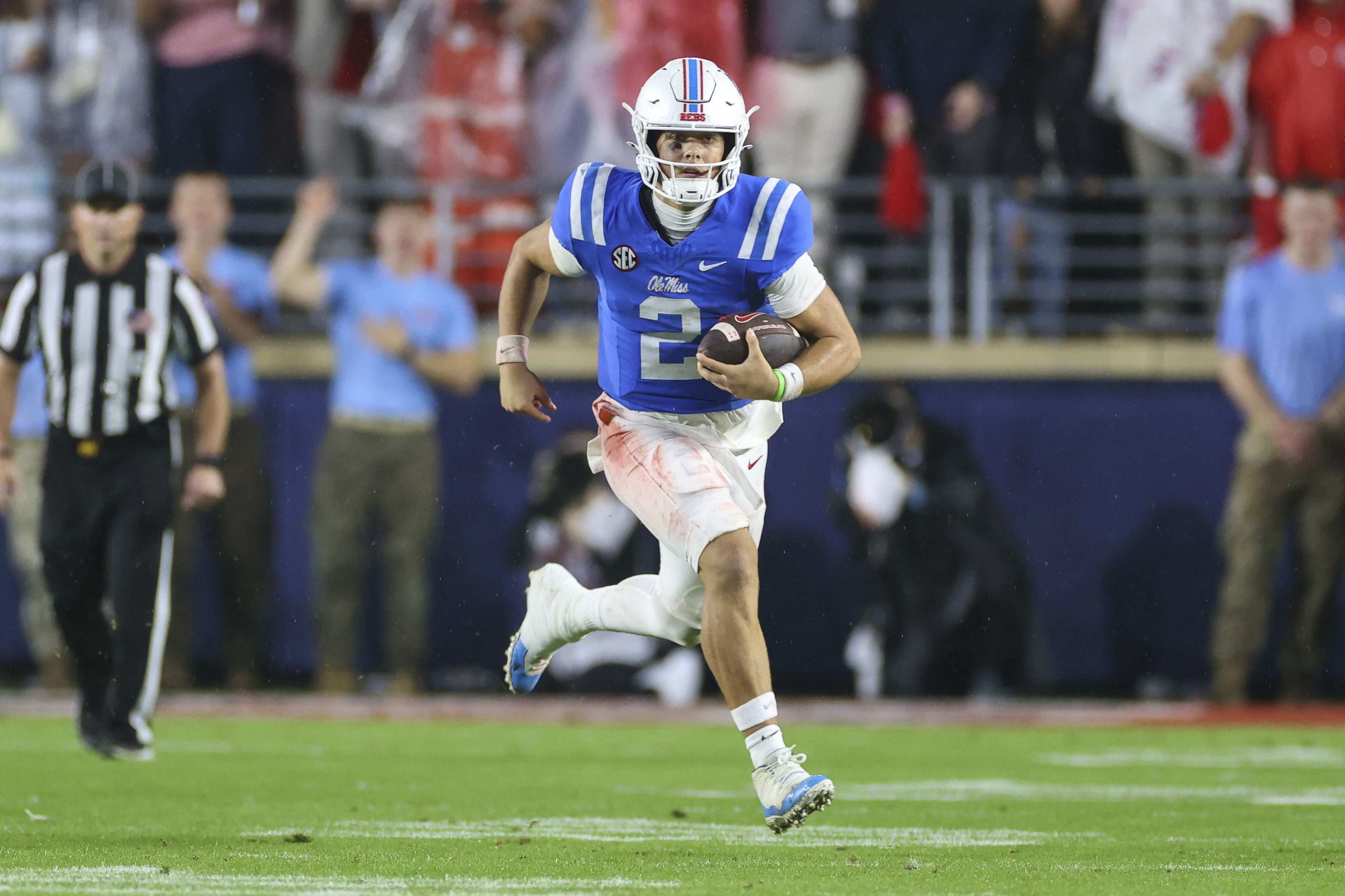 Mississippi quarterback Jaxson Dart (2) runs the ball during the second half of an NCAA college football game against Georgia on Saturday, Nov. 9, 2024, in Oxford, Miss. Mississippi won 28-10.