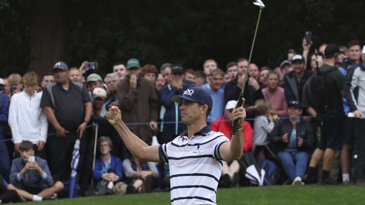 FILE - Billy Horschel of the United States reacts on the 18th green after winning a playoff to win the British PGA golf Championship at Wentworth golf club in Wentworth, England, Sept. 22, 2024.