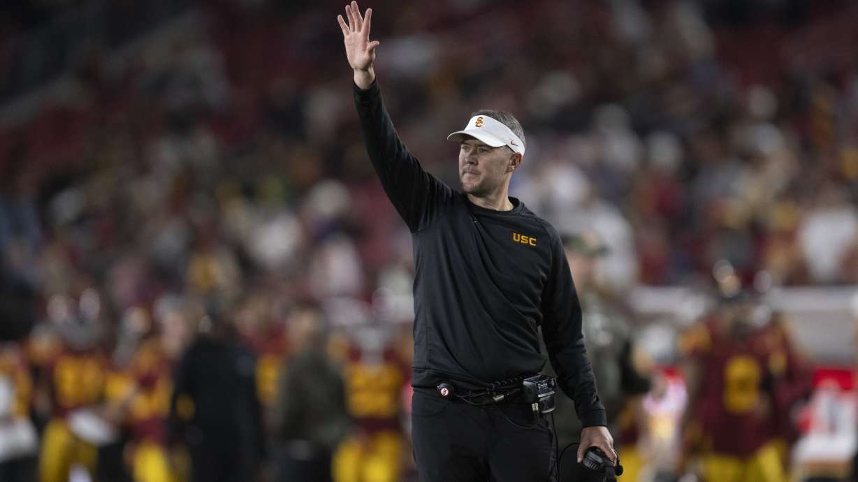 Southern California head coach Lincoln Riley gestures during the first half of an NCAA college football game against Rutgers, Friday, Oct. 25, 2024, in Los Angeles.