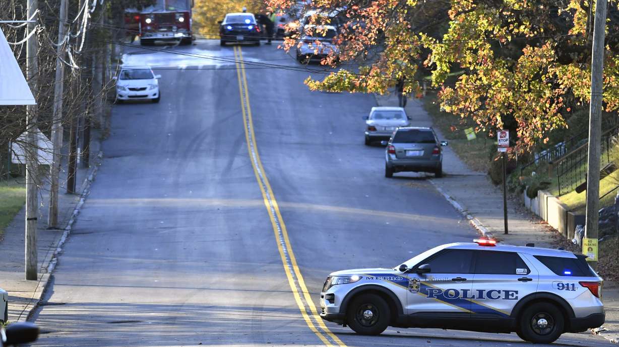 Members of the Louisville Metro Police and Louisville Fire Departments block access to Givaudan Sense Colour following an explosion at the facility in Louisville, Ky., Tuesday, Nov. 12.