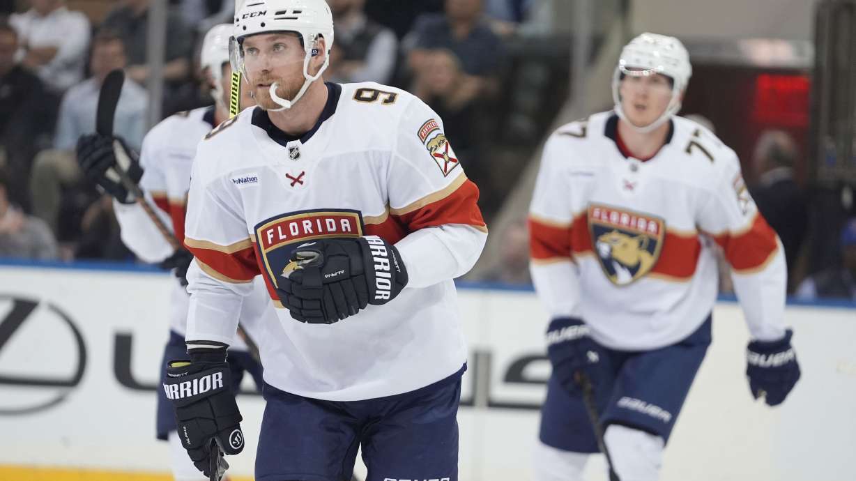 Florida Panthers' Sam Bennett (9) skates toward his bench after scoring during the second period of an NHL hockey game against the New York Rangers, Thursday, Oct. 24, 2024, in New York.