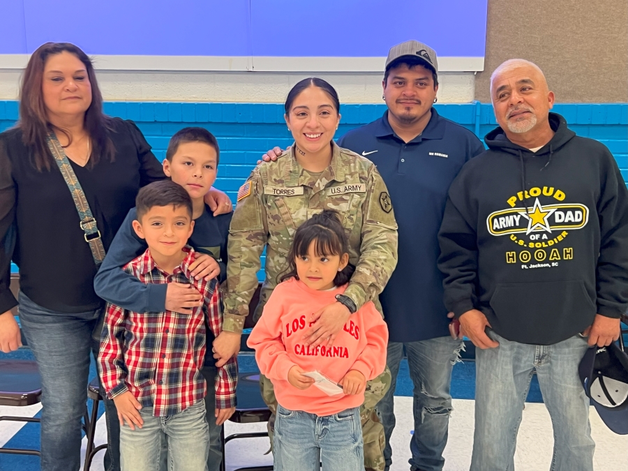 US Army mom surprises kids at school after returning home from deployment on Veterans Day