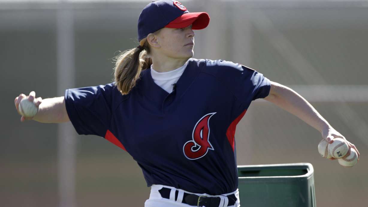 FILE - Justine Siegal throws during batting practice to Cleveland Indians minor leaguers during spring training, Feb. 21, 2011, in Goodyear, Ariz.