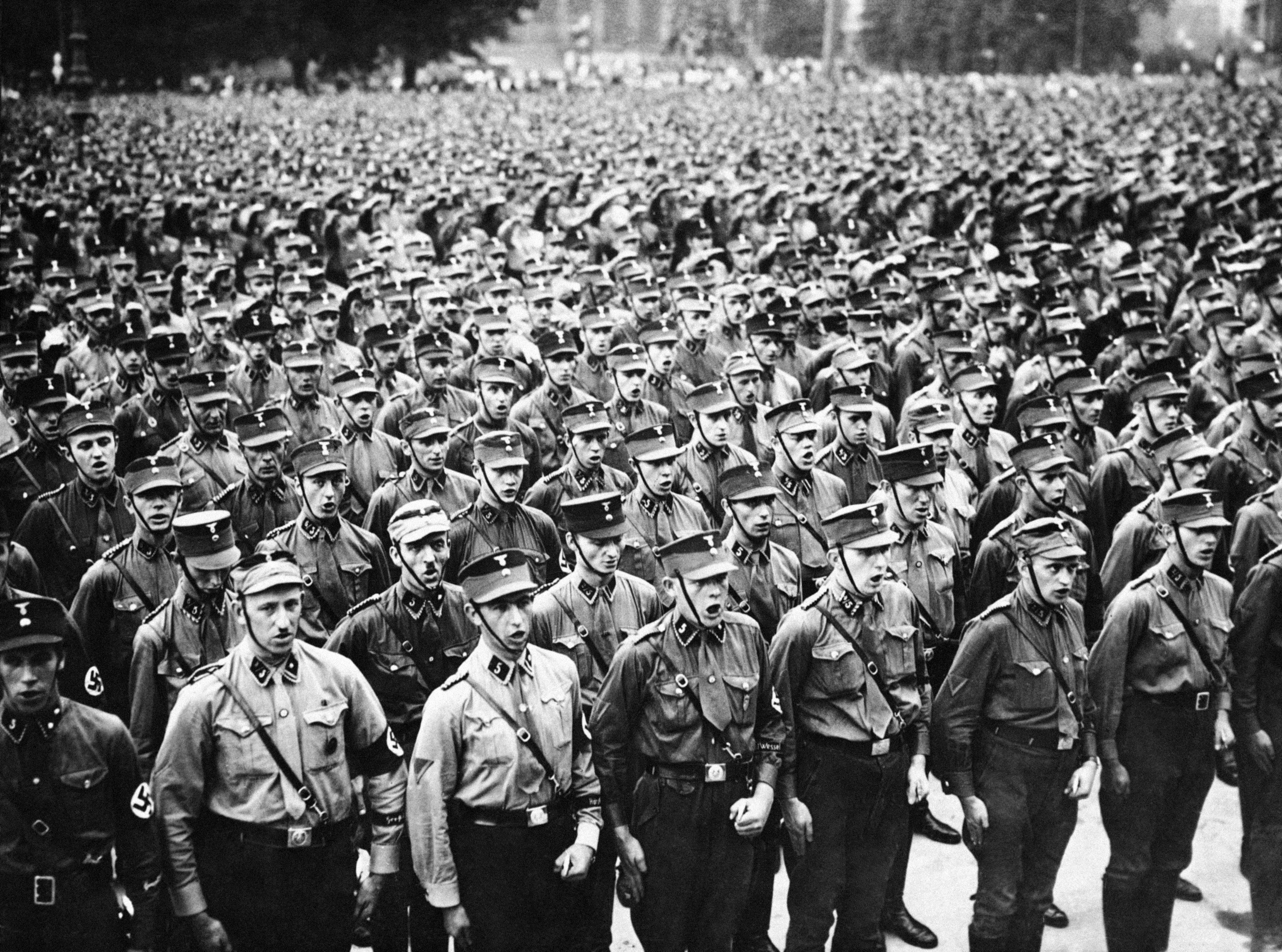 The 28th S.A. brigade listens to Minister Dr. Joseph Goebbels's speech in the Lustgarten of Berlin on Aug. 25, 1934.