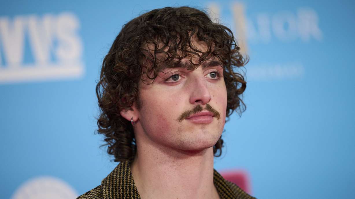 Benson Boone poses for photographers upon arrival at the MTV European Music Awards 2024 in Manchester, England, Nov. 10. Here's a look at his improbable rise to fame.