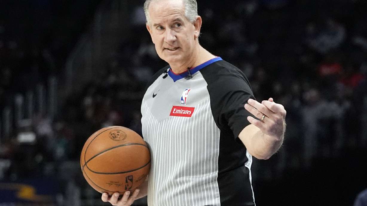 FILE - Referee Scott Wall prepares to put the ball in play during the second half of an NBA basketball game between the Detroit Pistons and the Brooklyn Nets, Thursday, March 7, 2024, in Detroit.