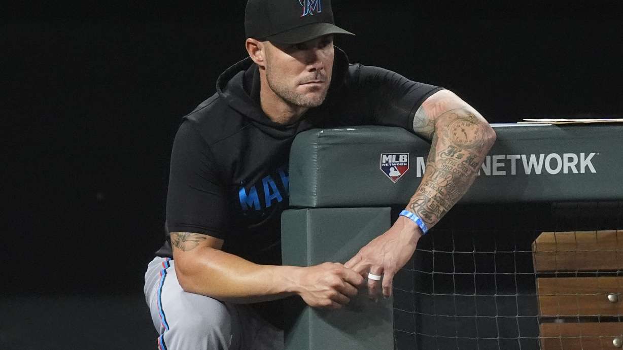 FILE - Miami Marlins manager Skip Schumaker looks on during the eighth inning of a baseball game against the Colorado Rockies, Aug. 27, 2024, in Denver.