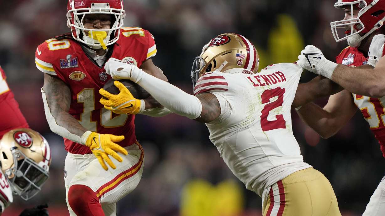 FILE - Kansas City Chiefs running back Isiah Pacheco (10) runs the ball past San Francisco 49ers defensive back Deommodore Lenoir (2) in NFL Super Bowl 58 football game, Feb. 11, 2024, in Las Vegas.