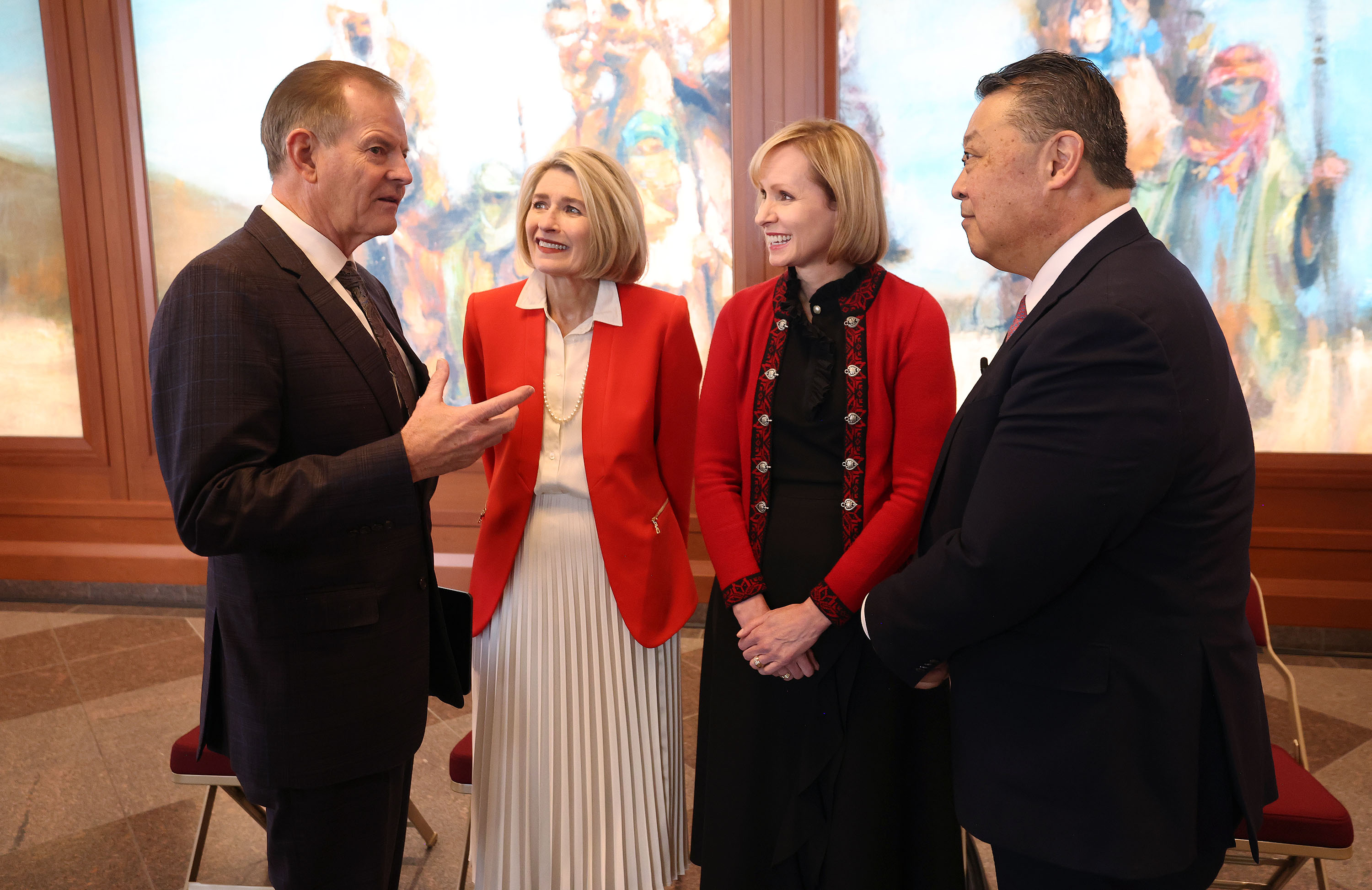 Elder Gary E. Stevenson of the Quorum of the Twelve Apostles; Relief Society General President Camille N. Johnson; Sister Amy A. Wright, first counselor in the Primary general presidency; and Elder Takashi Wada, general authority seventy, speak prior to hosting the global launch of the Light the World Giving Machines at the Conference Center in Salt Lake City on Wednesday.