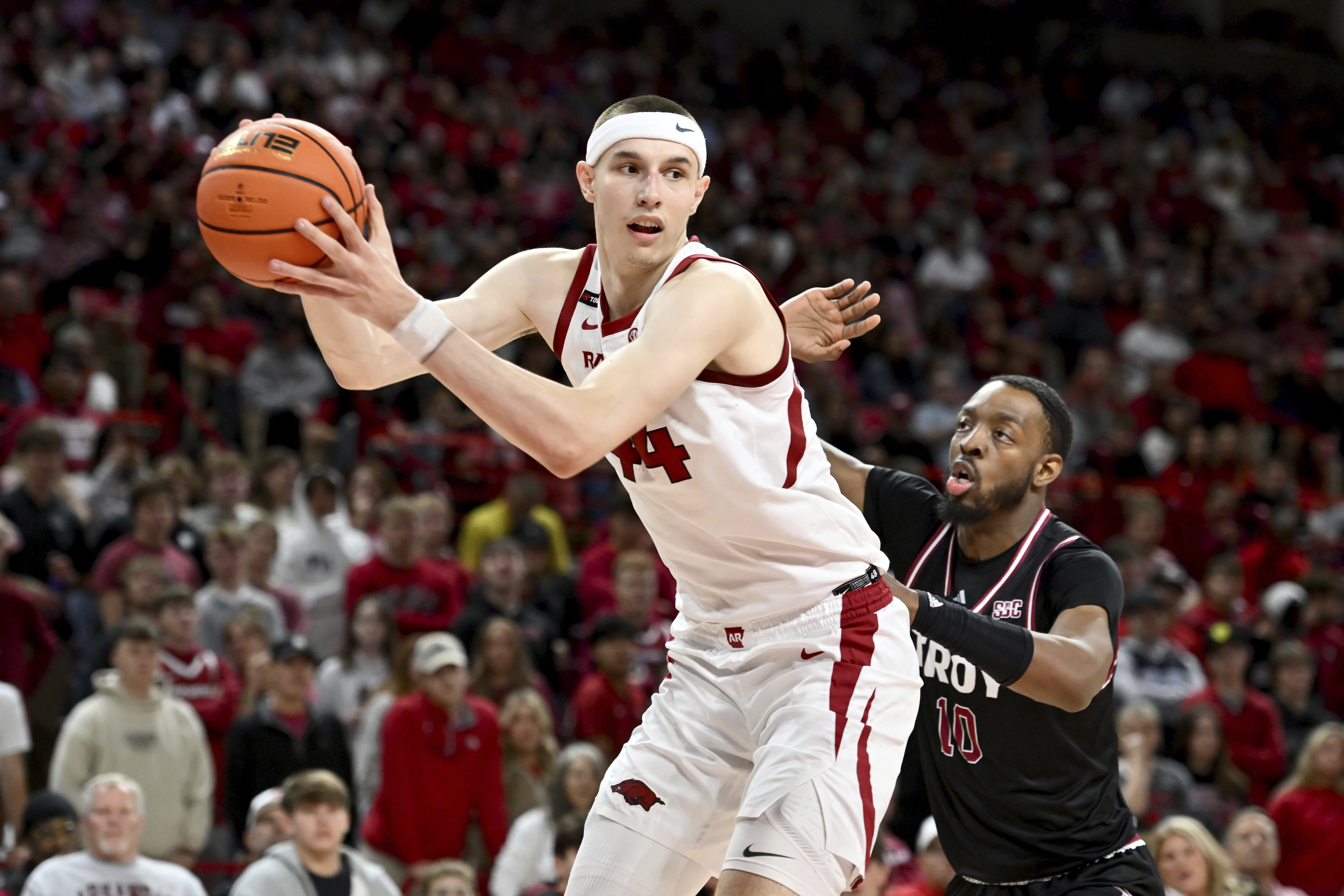 No. 18 Arkansas uses second-half run to beat Troy 65-49