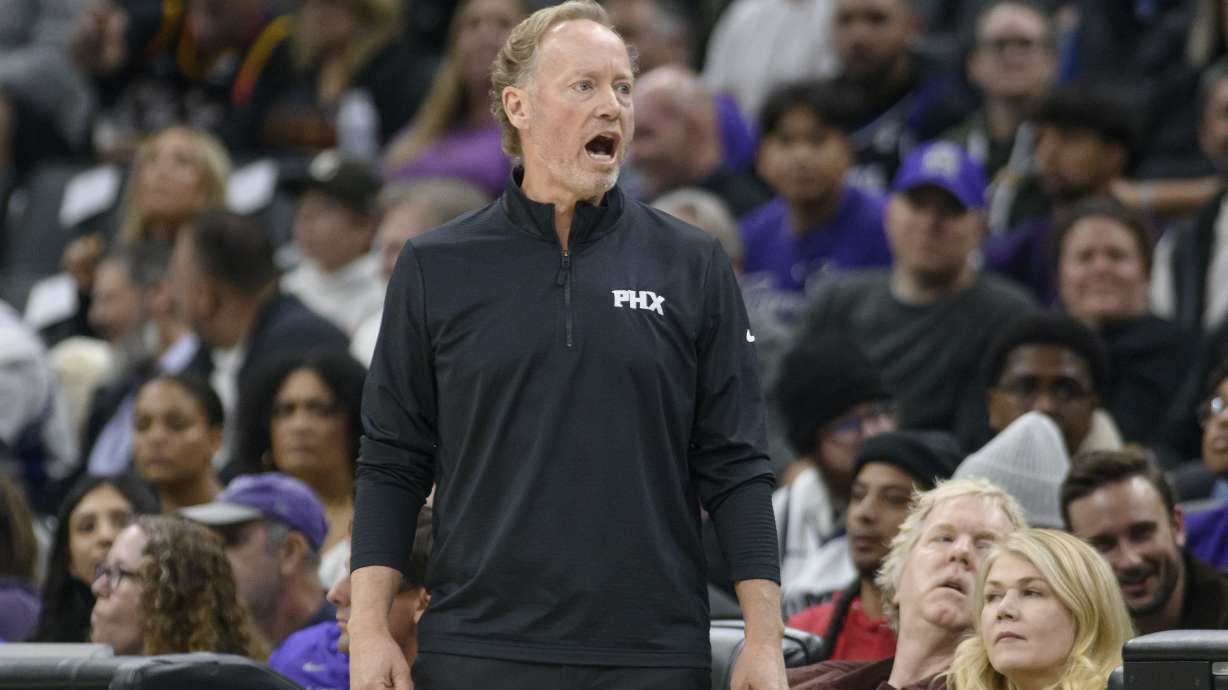 Phoenix Suns head coach Mike Budenholzer shouts from the bench during the first half of an NBA basketball game against the Sacramento Kings in Sacramento, Calif., Wednesday, Nov. 13, 2024.